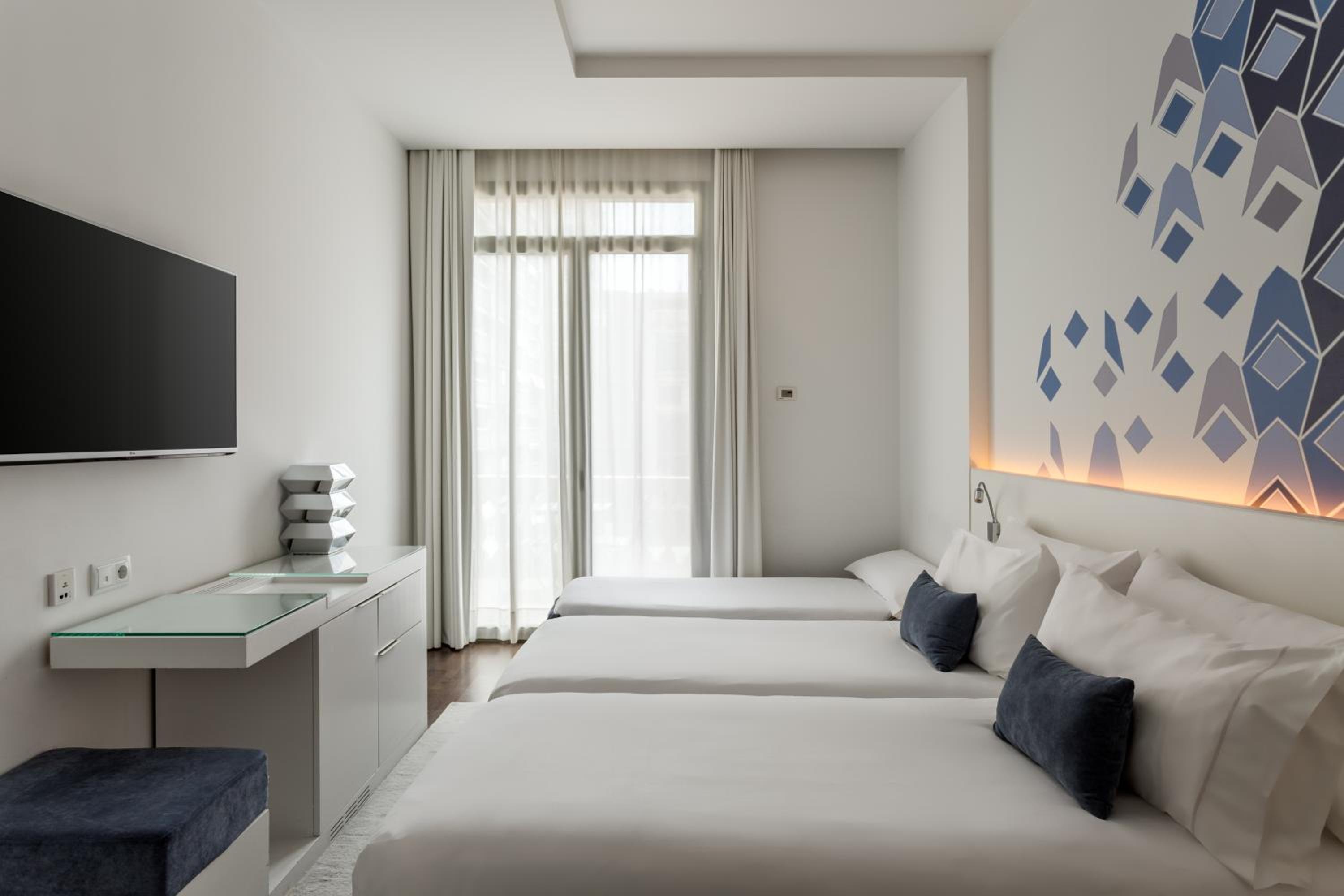Double or Twin Room with Extra Bed photo 2