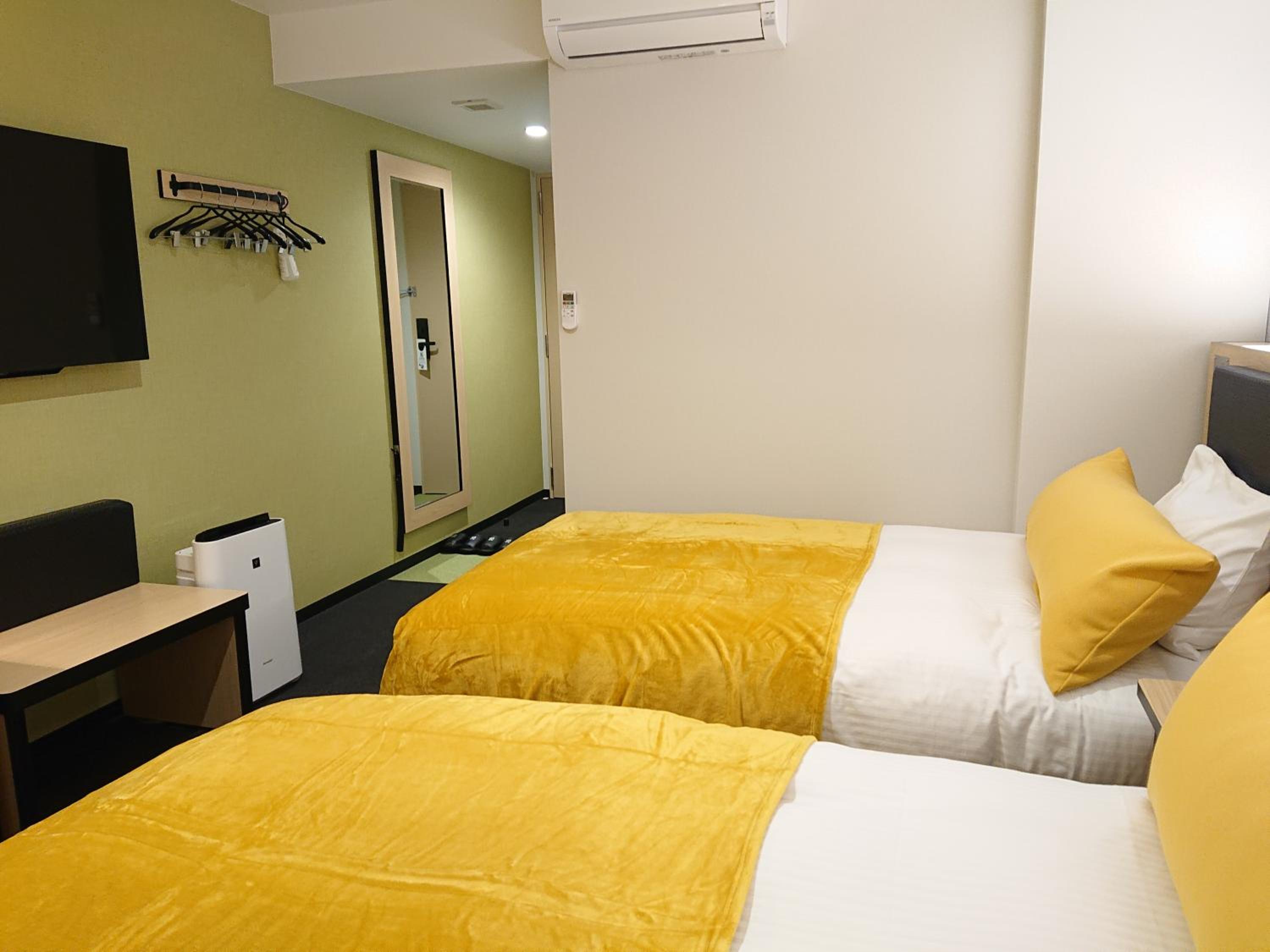 Twin Room A - Non-Smoking - Photo 10