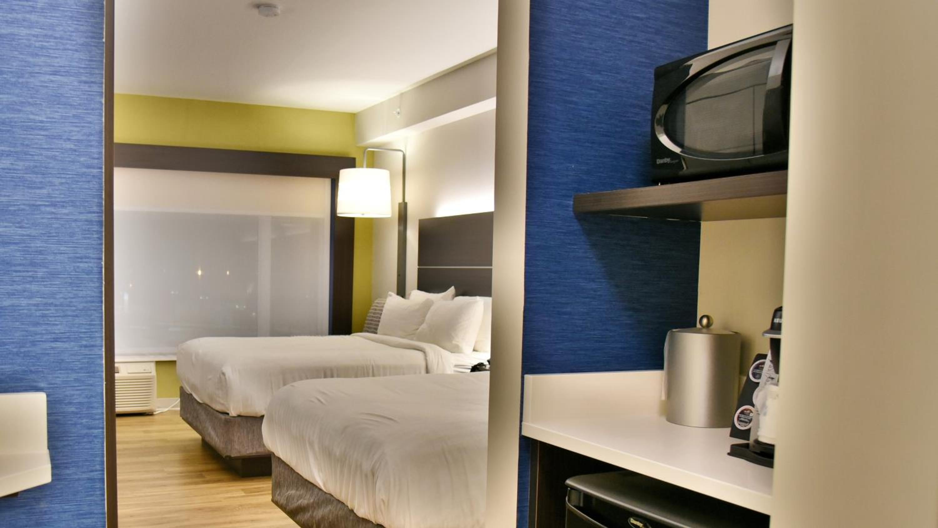 Standard Queen Room with Two Queen Beds and Walk-In Shower photo 1