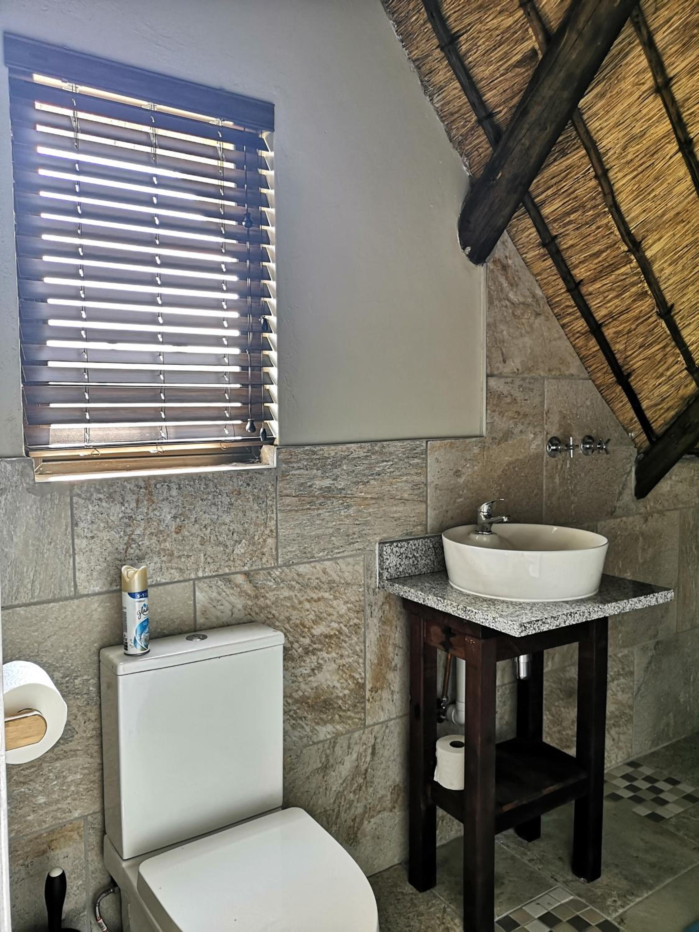Three-Bedroom House - Photo 18