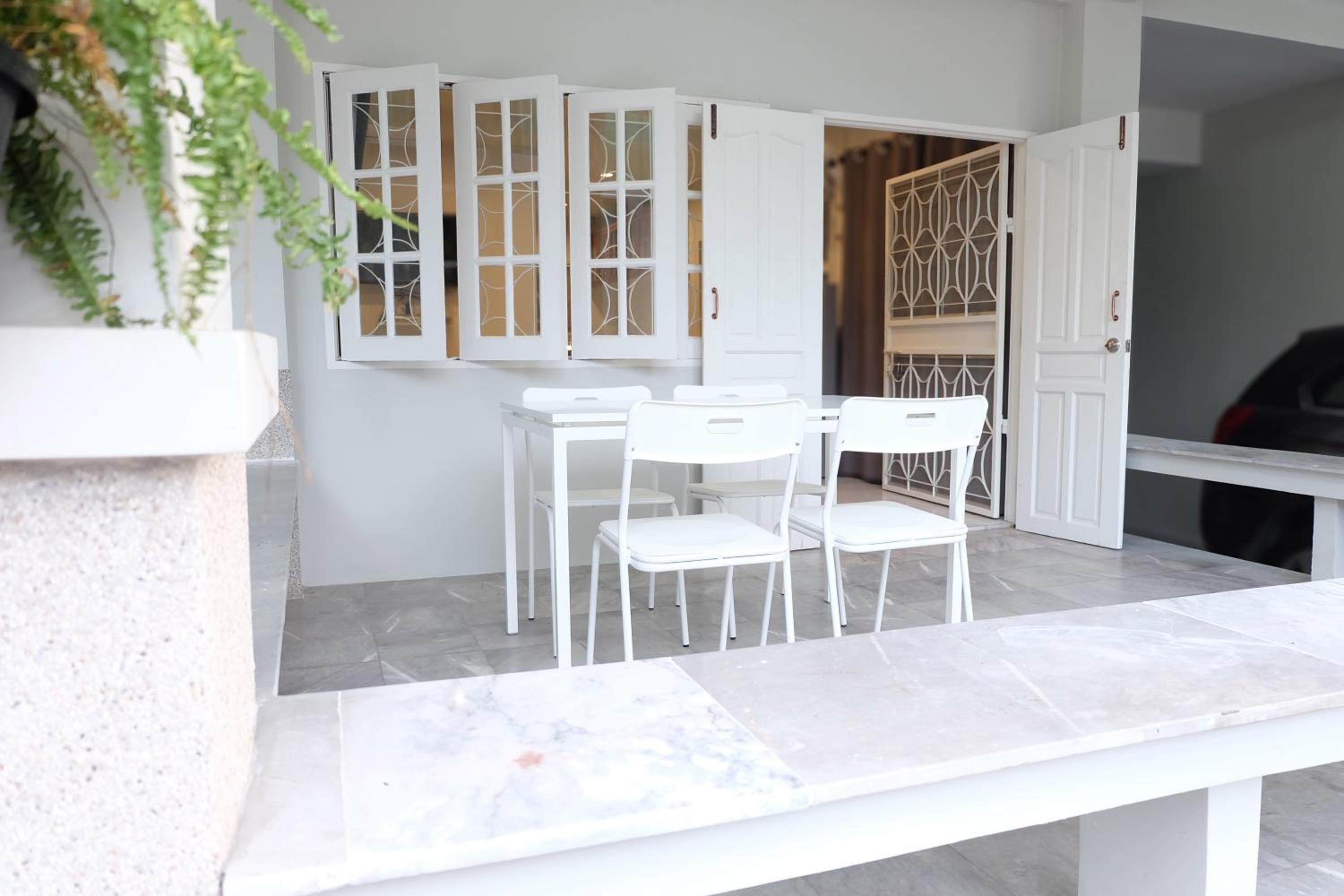 Four-Bedroom House - Photo 35