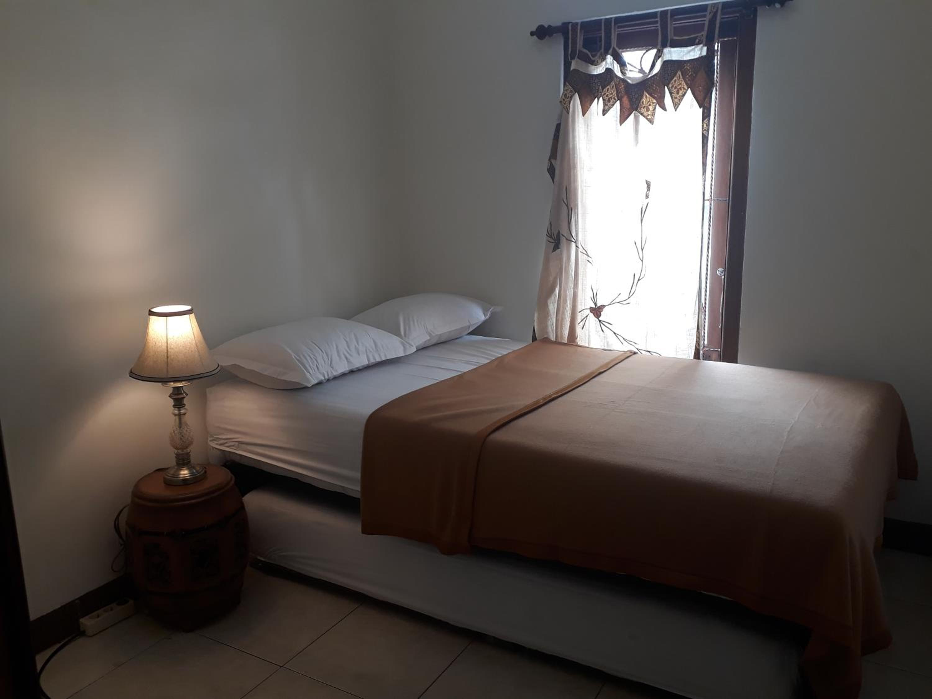 Four-Bedroom House - Photo 18