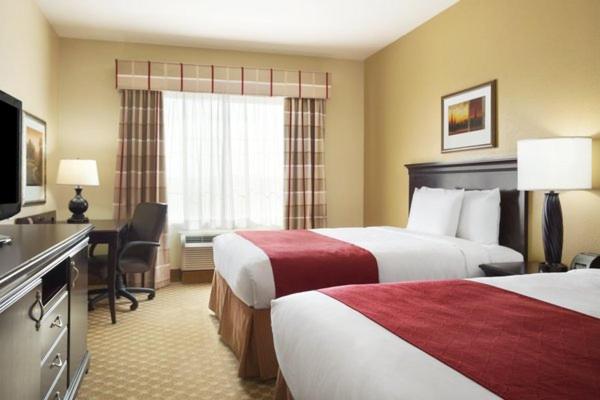 Queen Room with Two Queen Beds - Photo 1