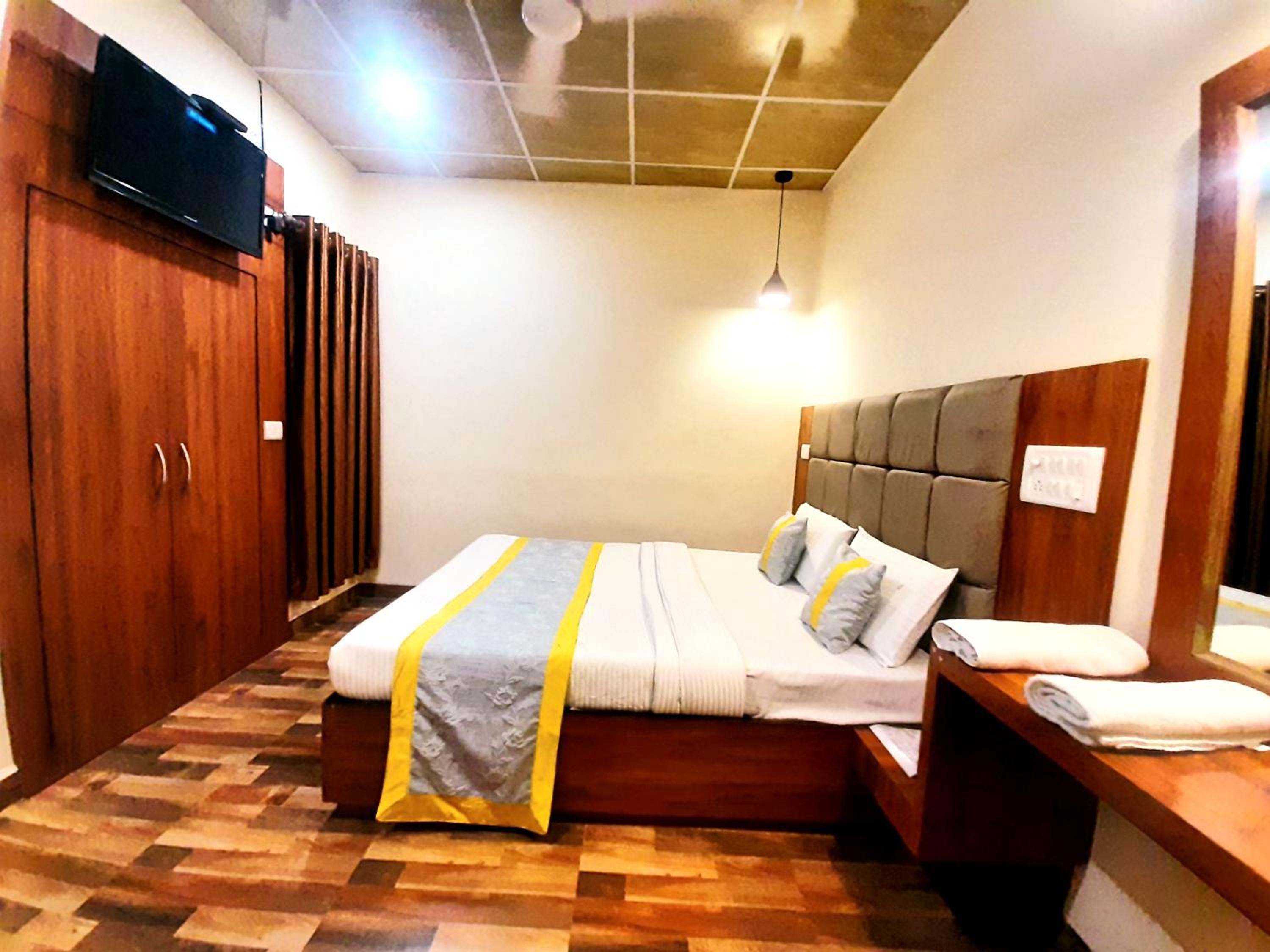 Deluxe Room - Photo 1