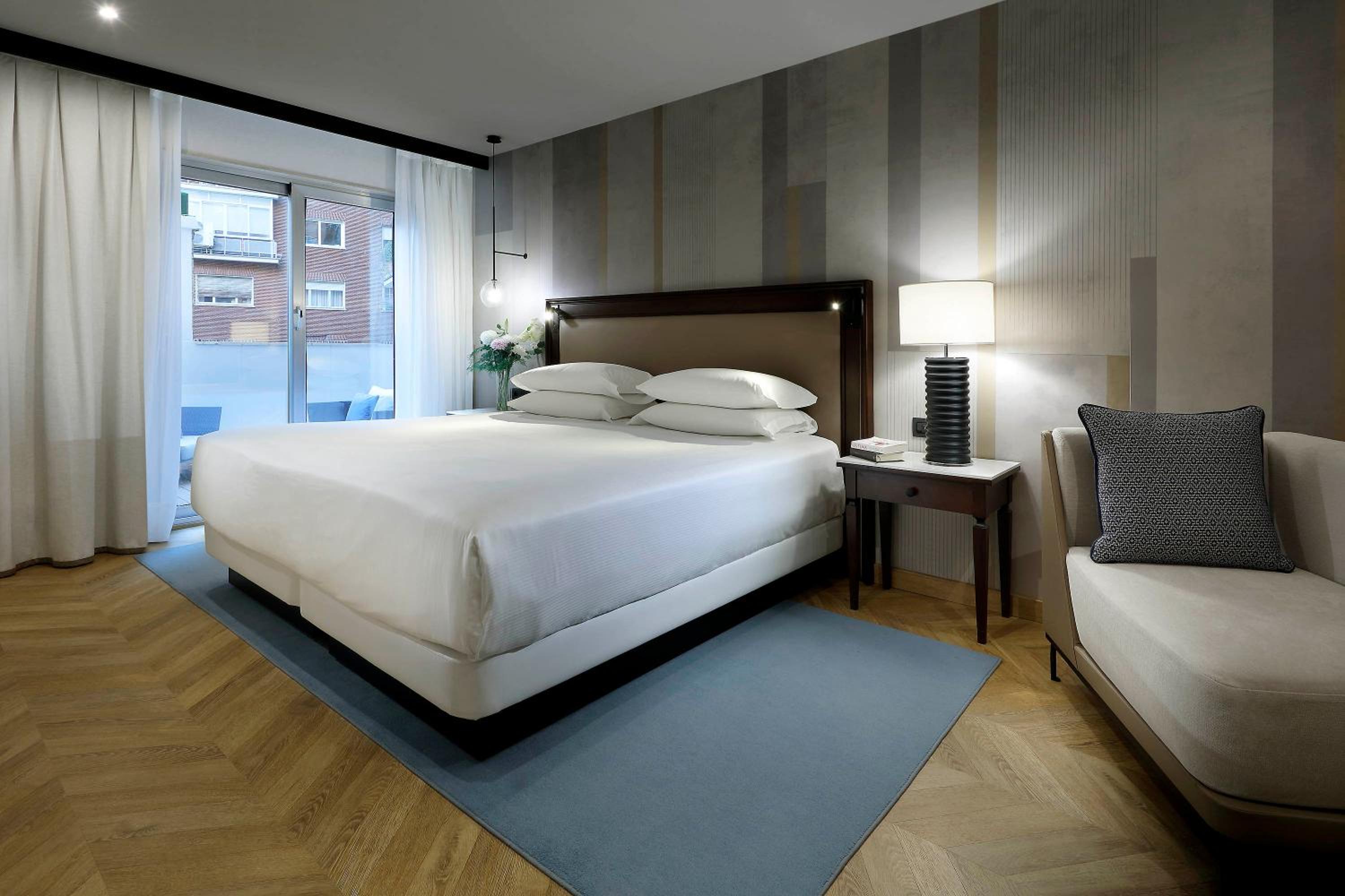 Habitación King con Balcón