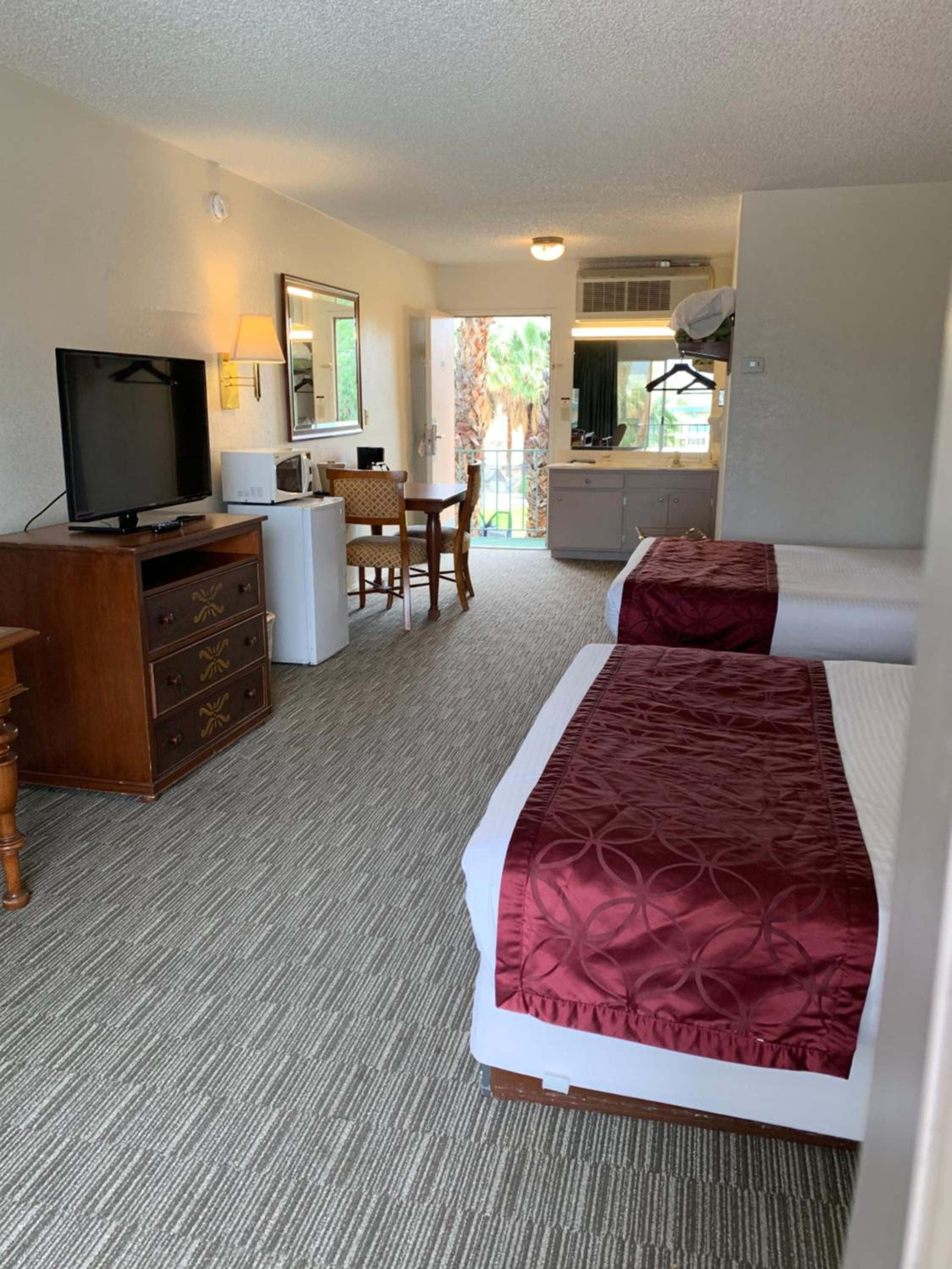 Deluxe Queen Room with Two Queen Beds - Photo 1