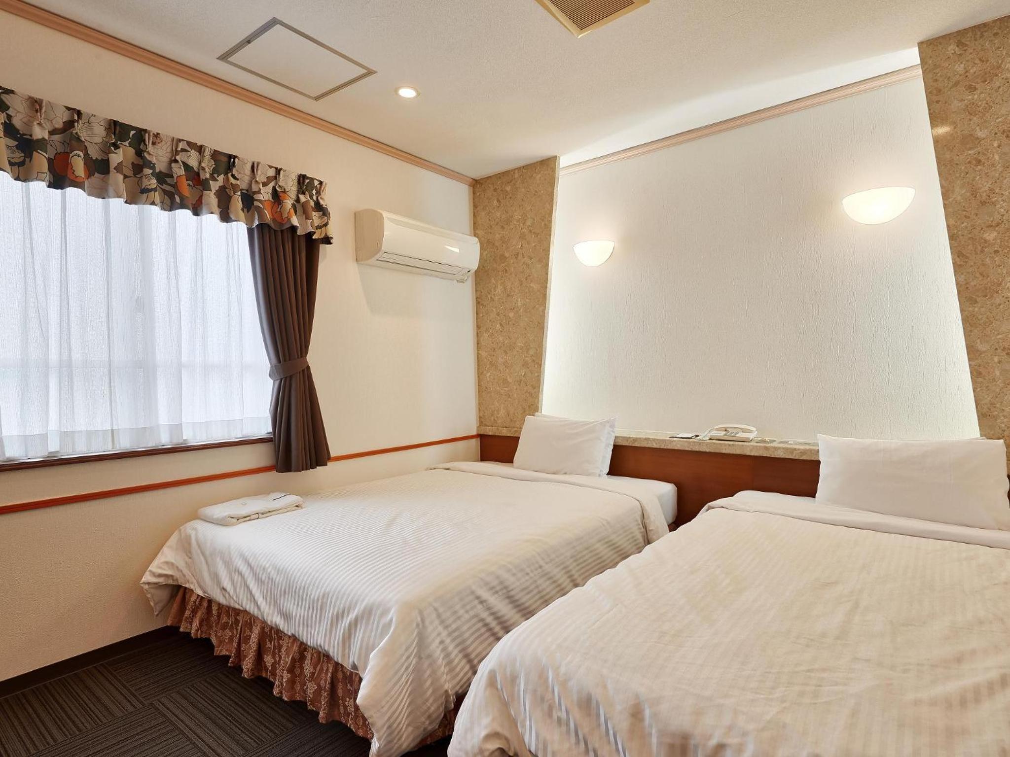 Twin Room - Photo 6