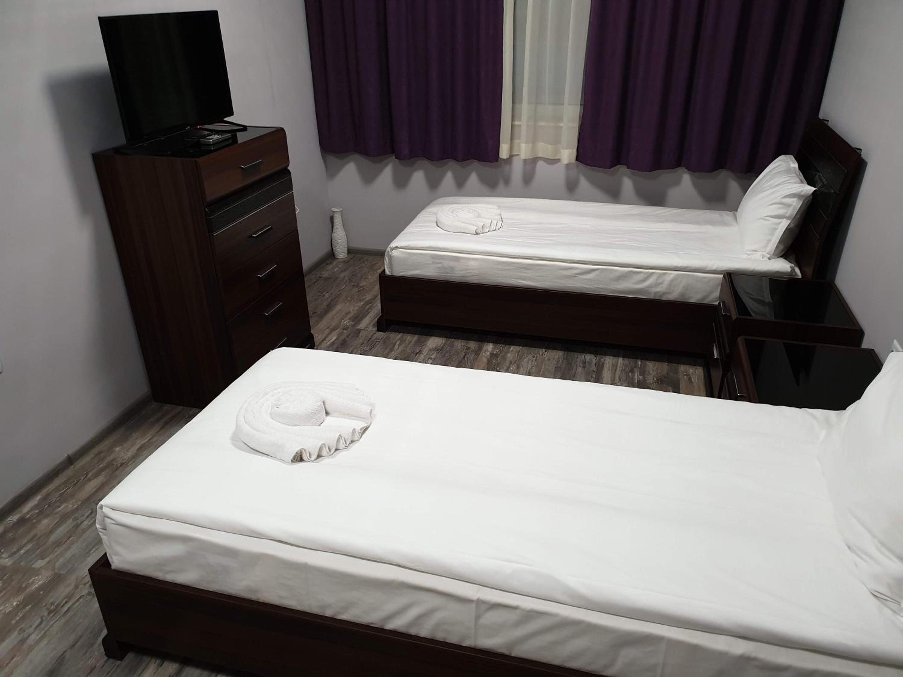 Twin Room - Photo 1