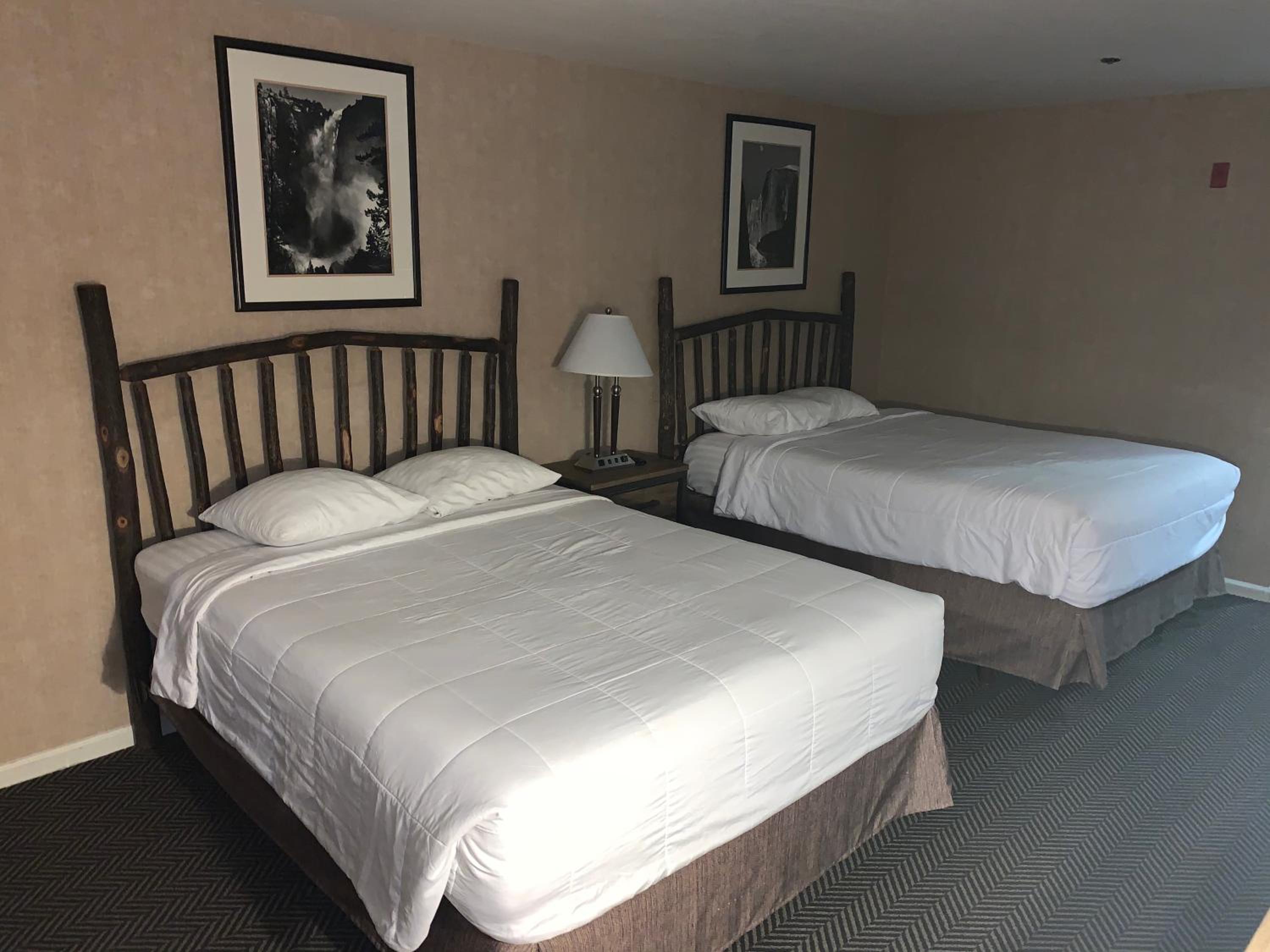 Queen Room with Two Queen Beds - Photo 1