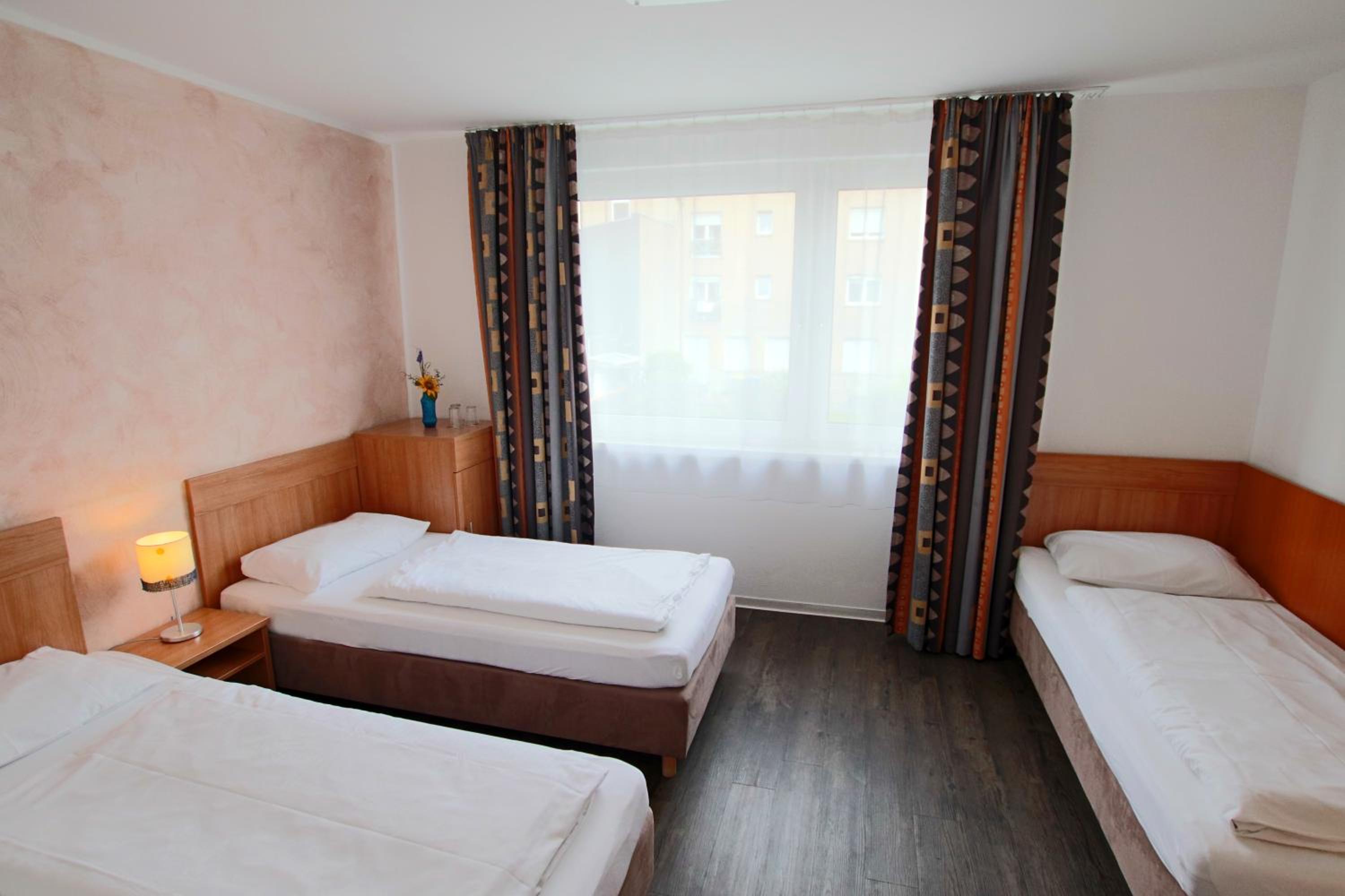Triple Room - Photo 1