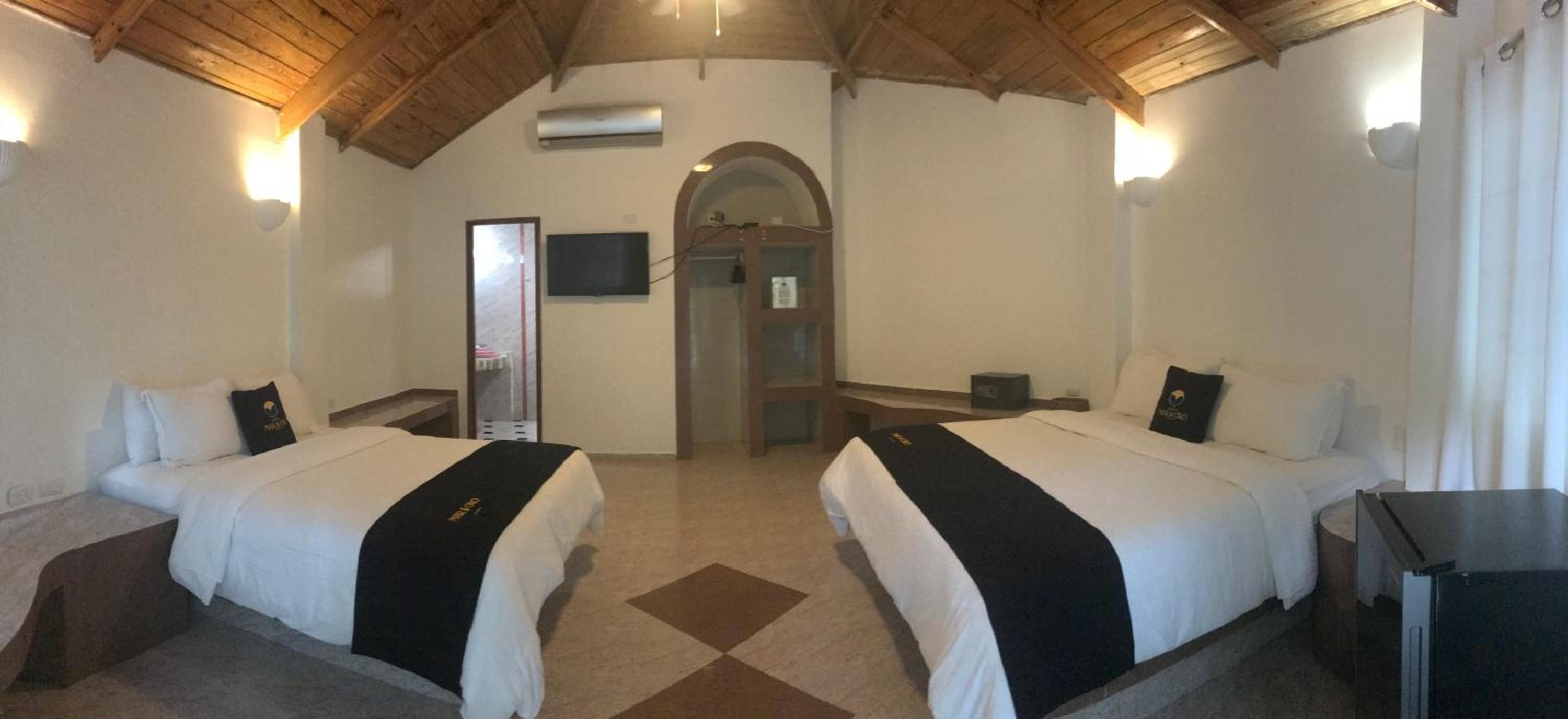 King and Queen Beds with Patio View