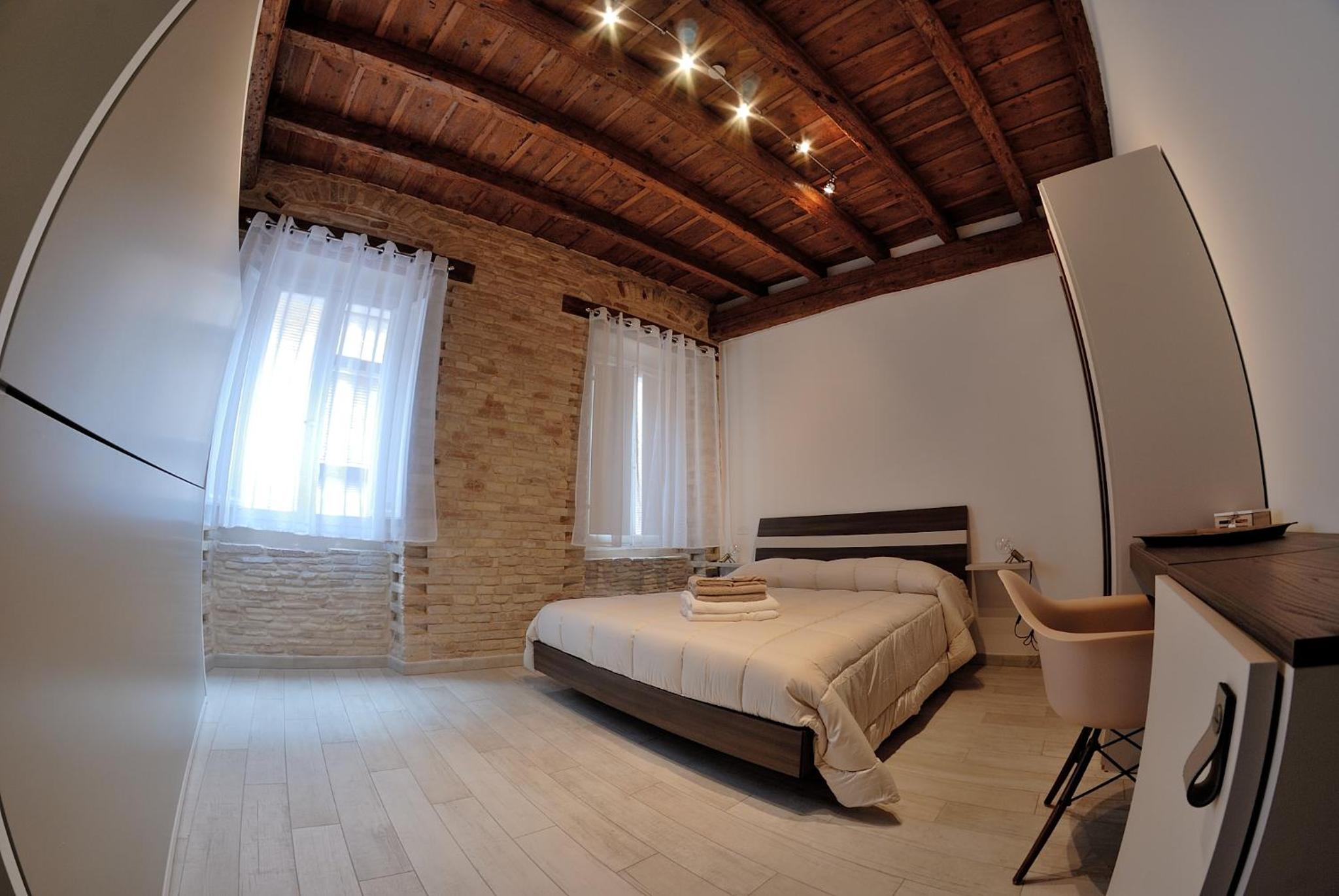 Deluxe Quadruple Room - Photo 8