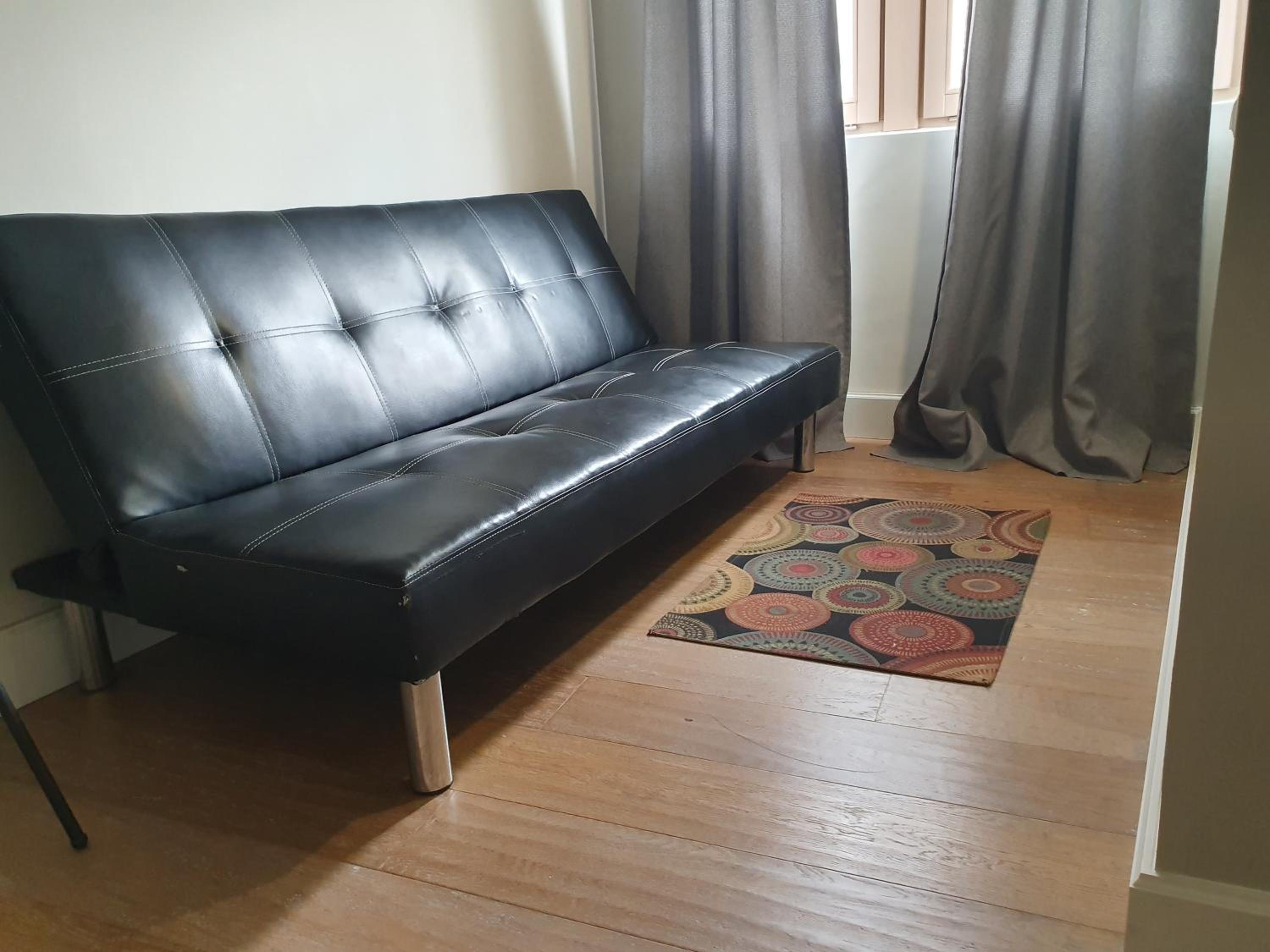 Three-Bedroom Apartment - Photo 8