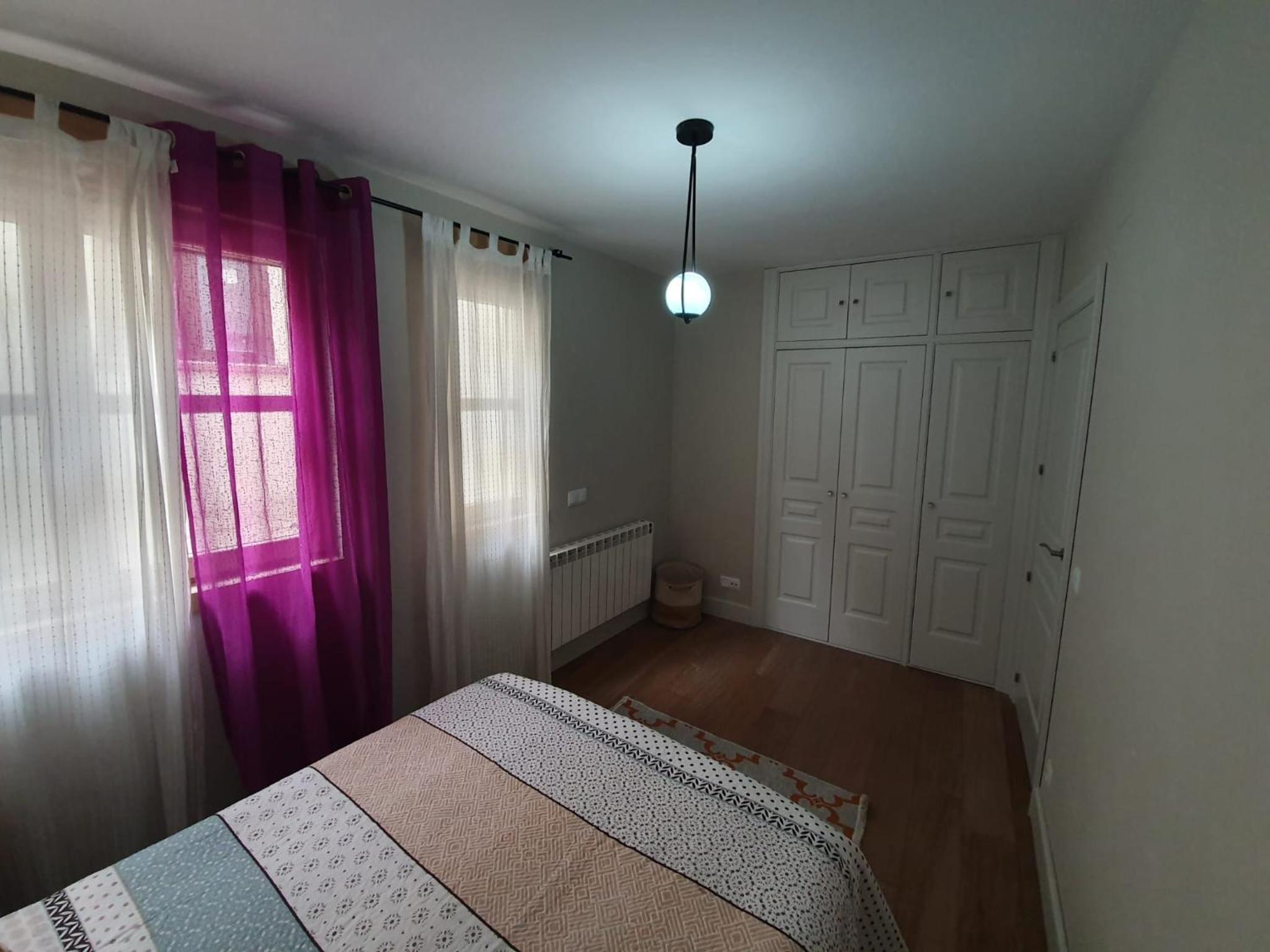 Three-Bedroom Apartment - Photo 12