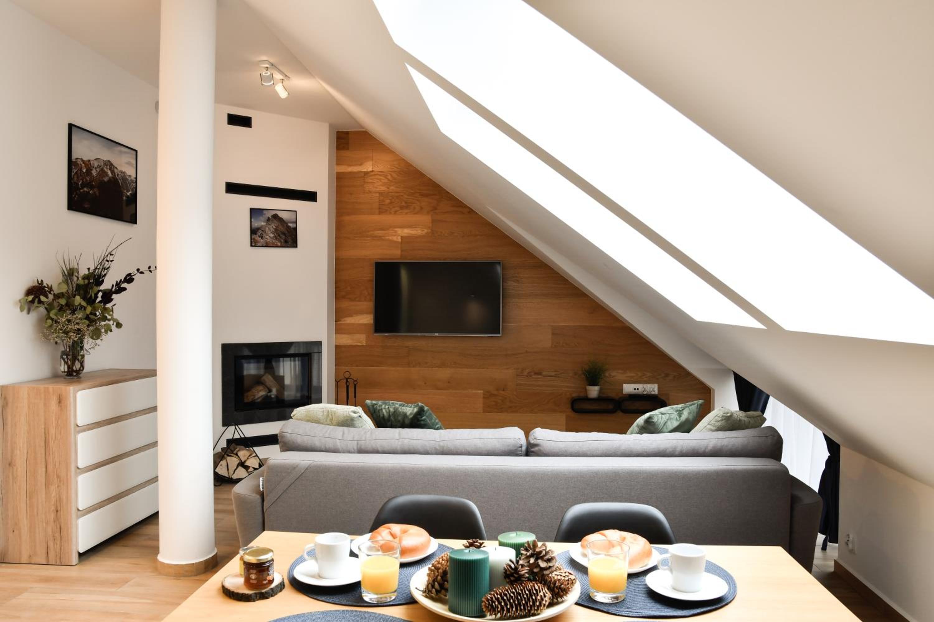 One-Bedroom Comfort Apartment with Fireplace and air conditioning in the Attic