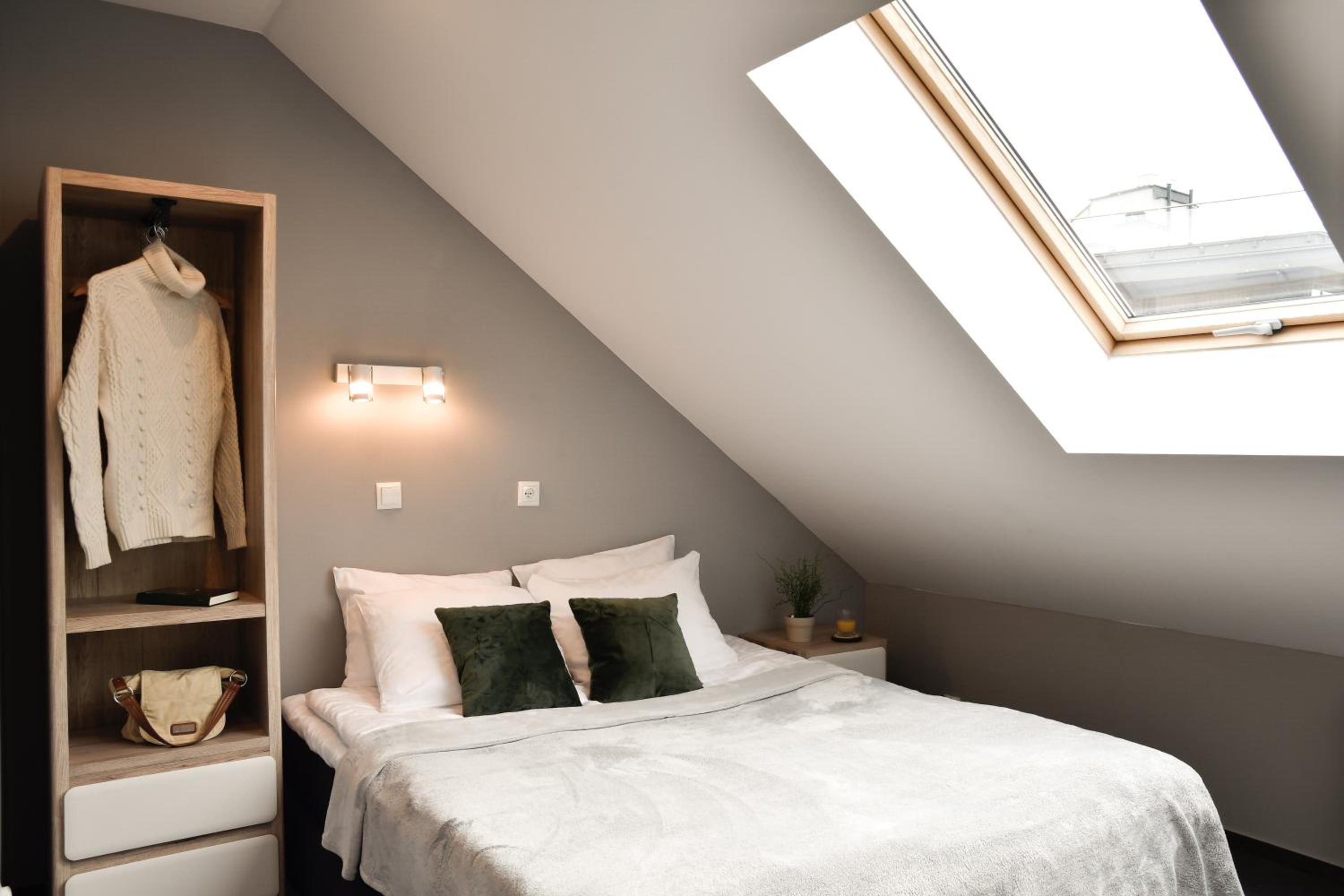 Deluxe Two-Bedroom Apartment with Balcony and air conditioning in the Attic - Photo 1