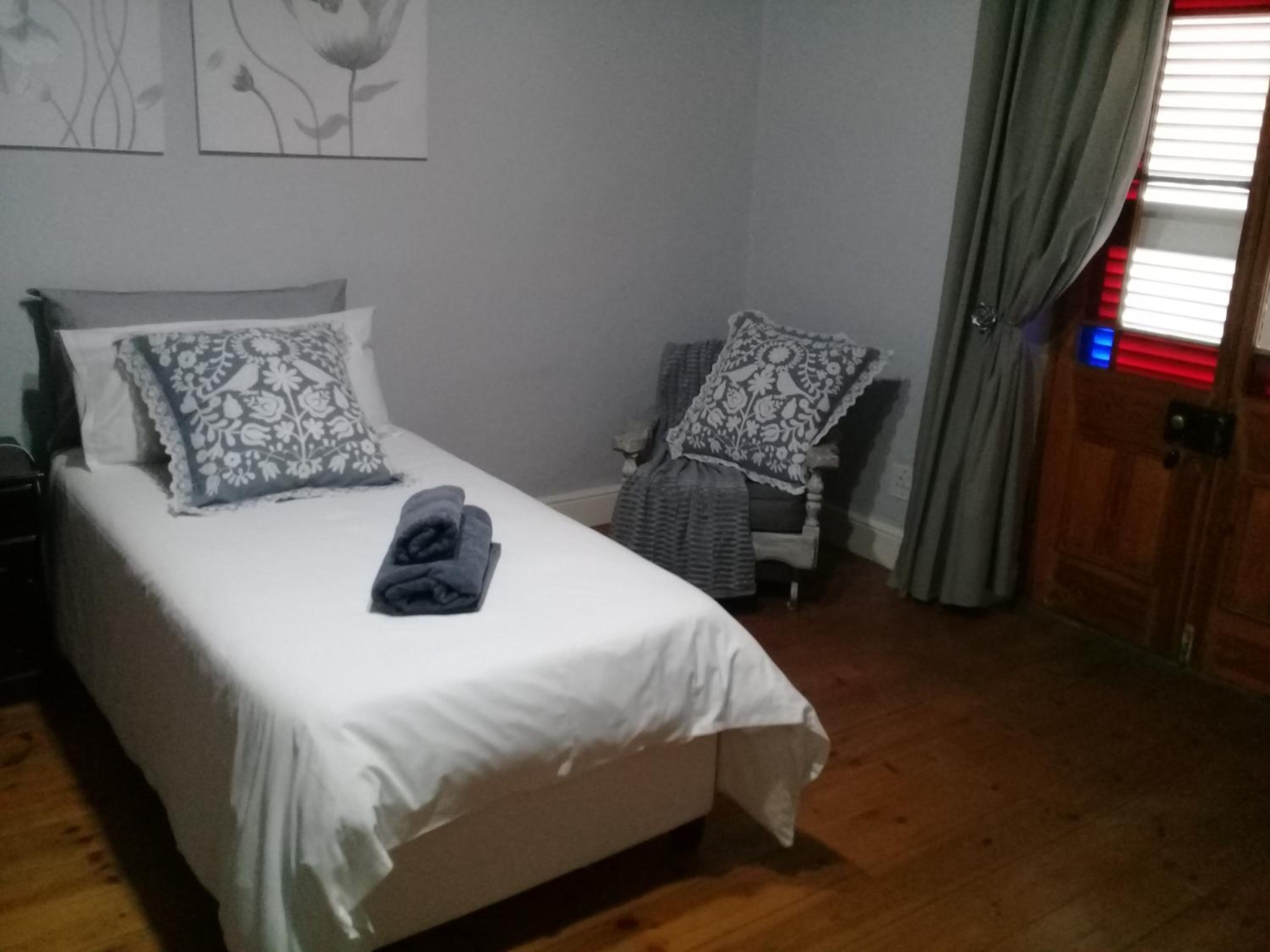 Single Room with Shared Shower and Toilet
