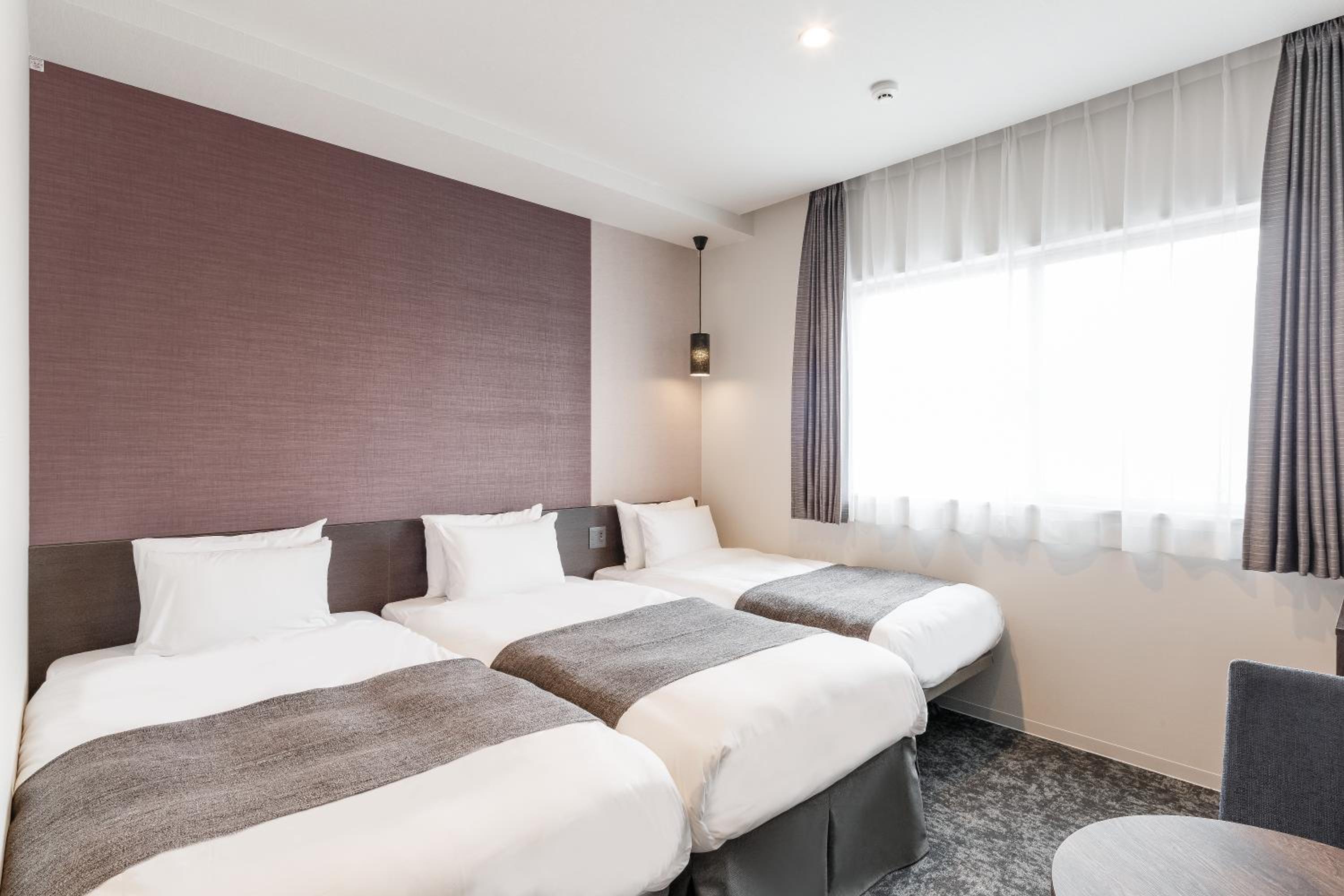 Twin Room with Extra Bed - Photo 1