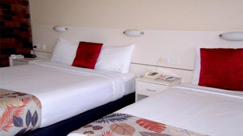 Twin Room with Two Double Beds - Photo 1