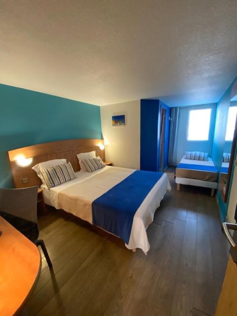 Triple Room - Photo 1