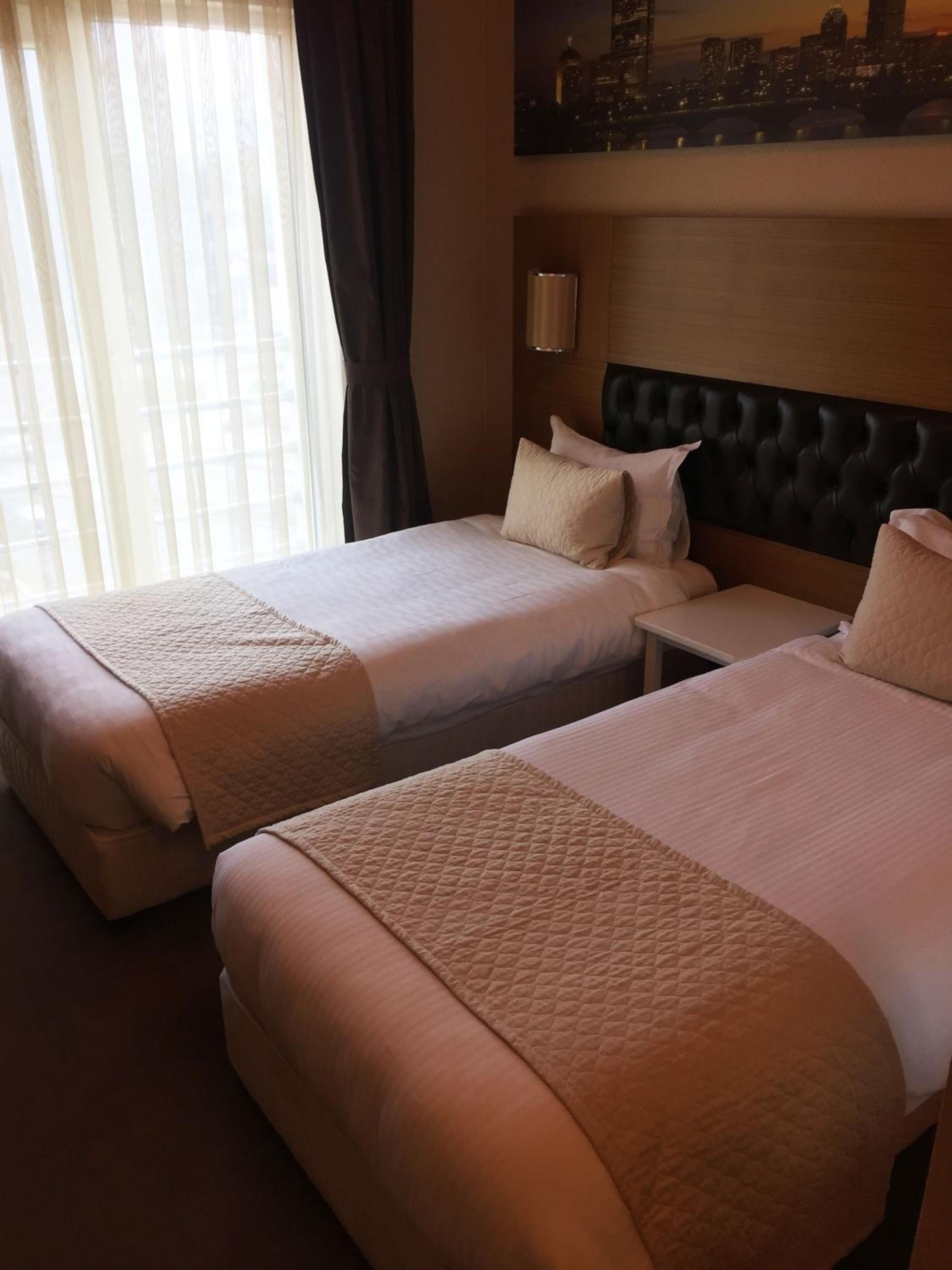 Twin Room - Photo 1