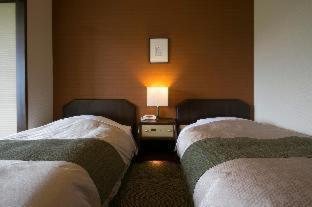 Standard Twin Room - Photo 4