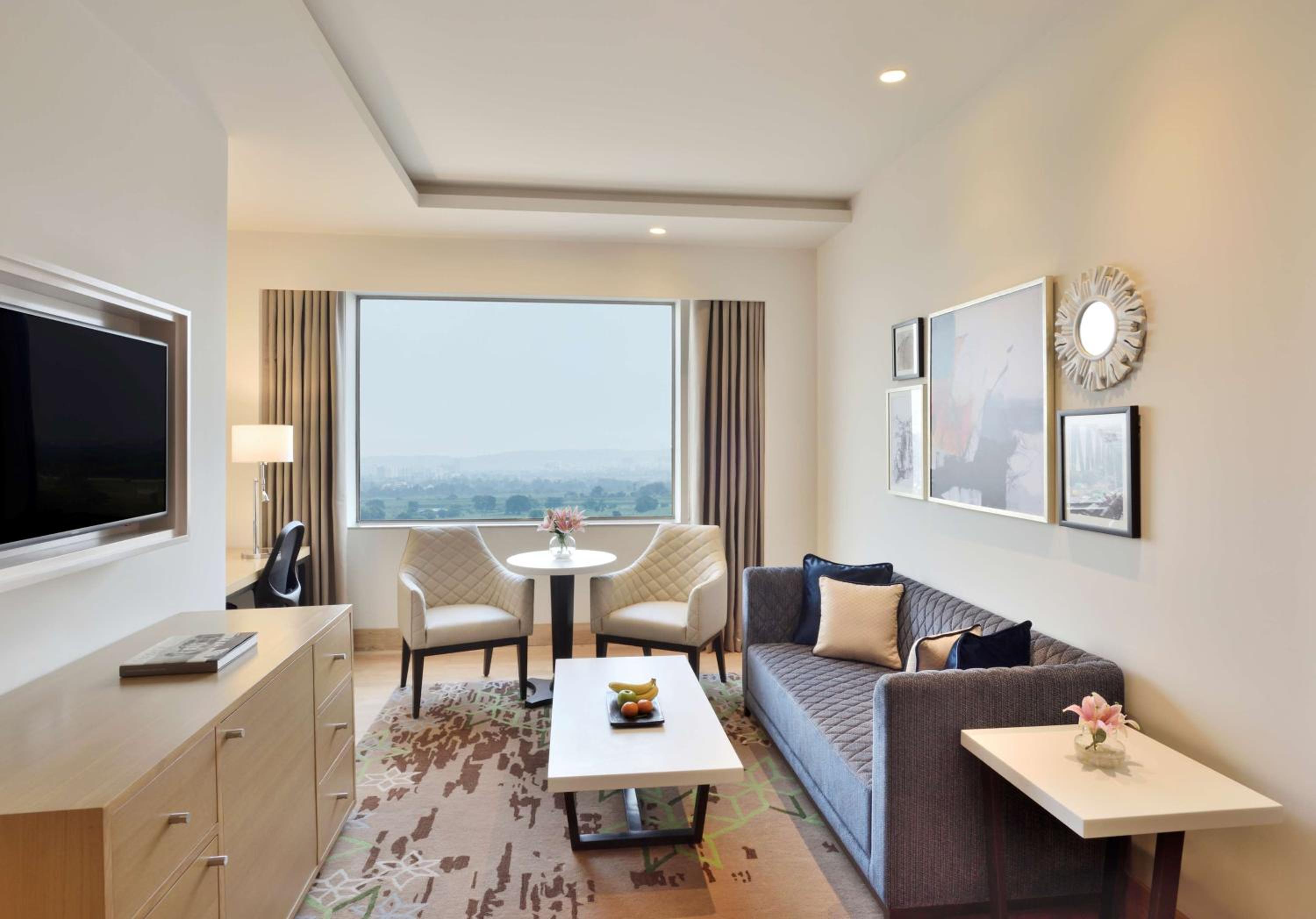 Executive Suite with 20% Dis on F&B, Comp 2 Soft drinks at BAR, 20% Dis on SPA, Early Check-in by 11 AM & Late check-out by 3 PM (Subject to avl), 2 Way Airport Transfers & 4 Pieces Laundry, One comp 30-minute pickleball session per stay (Subject to avl) photo