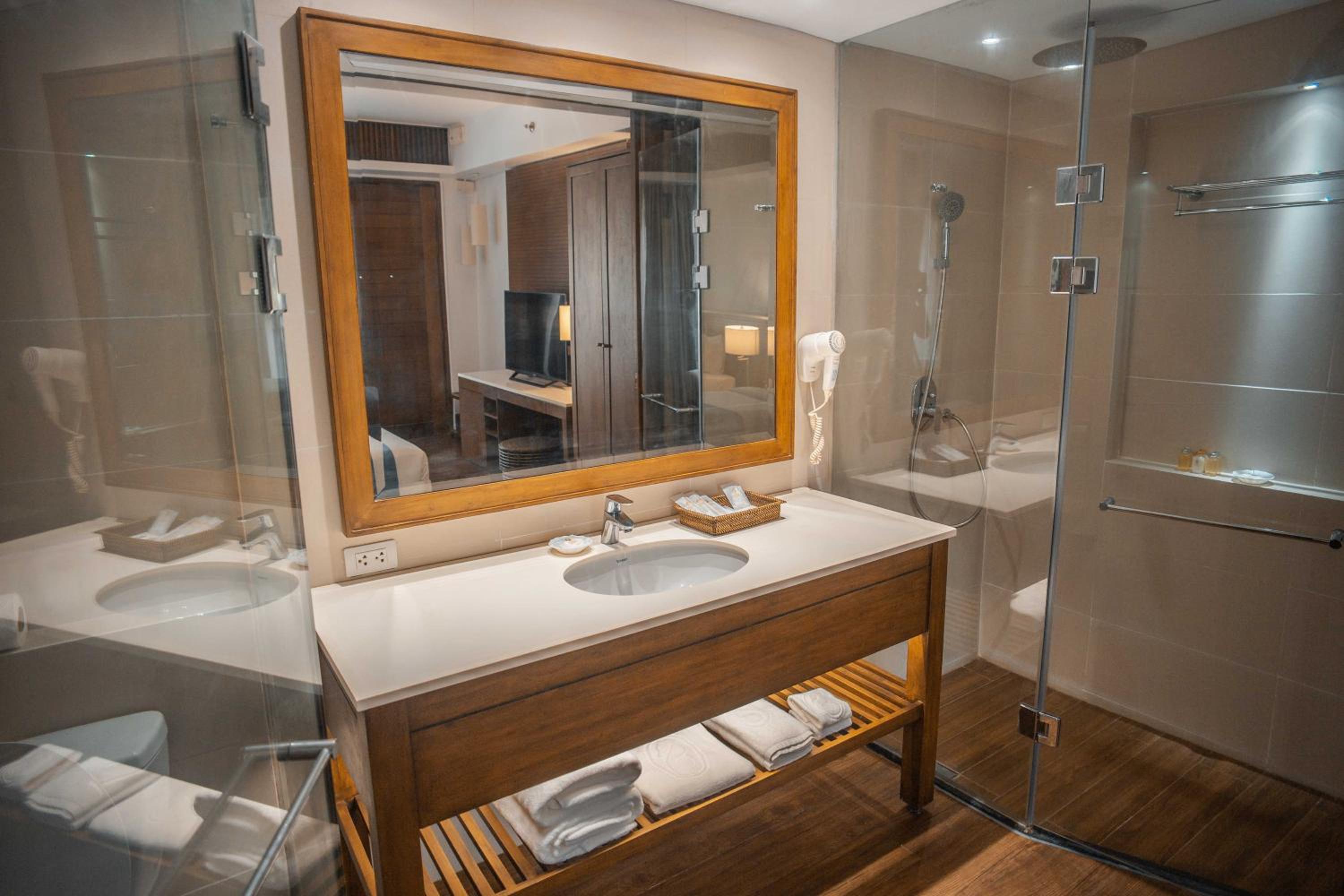 Deluxe Quadruple Room - Photo 8