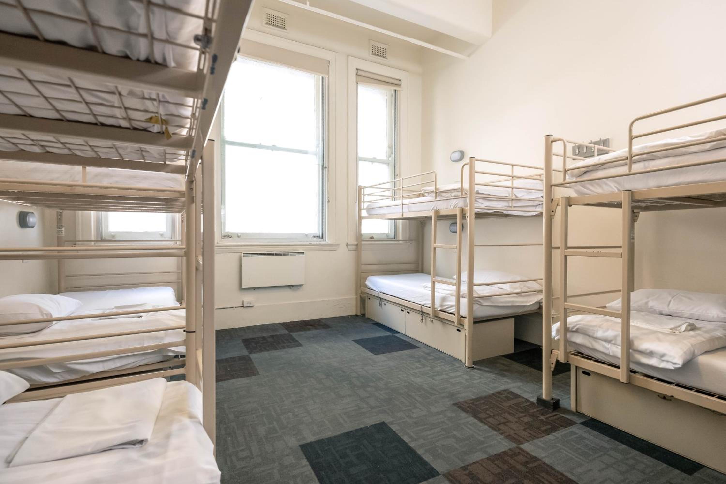 Bed in 8-Bed Female Dormitory Room with Shared Bathroom  photo 1