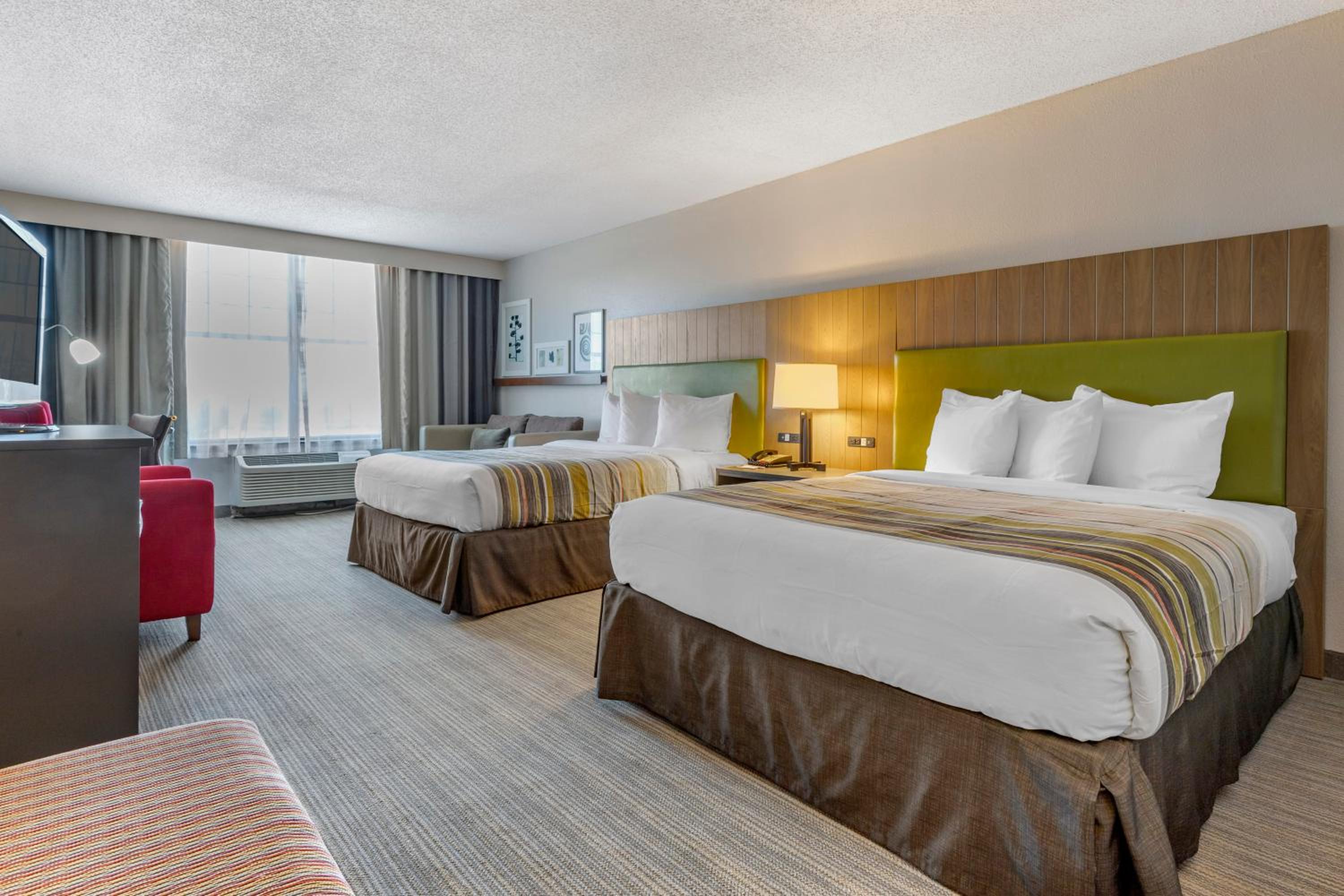 Queen Room with Two Queen Beds - Photo 1