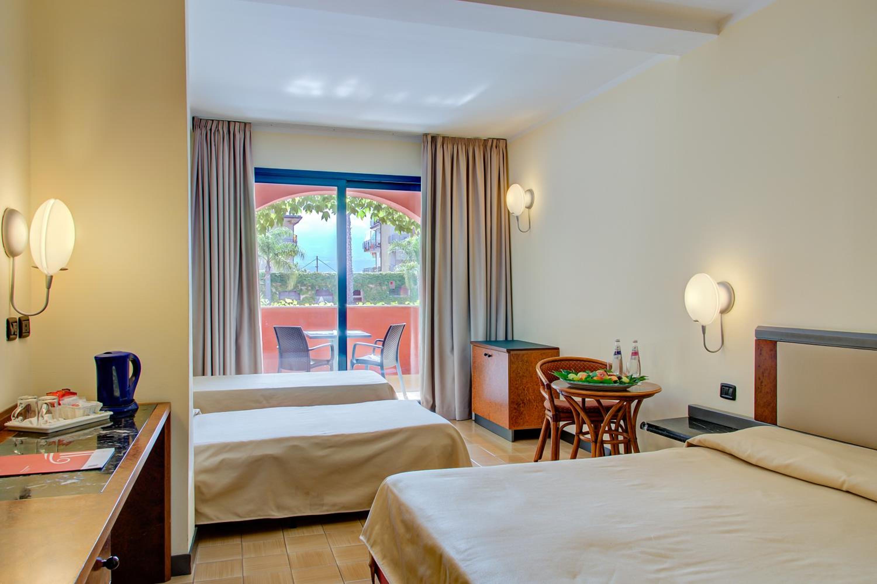 Deluxe Quadruple Room with Balcony - Photo 1
