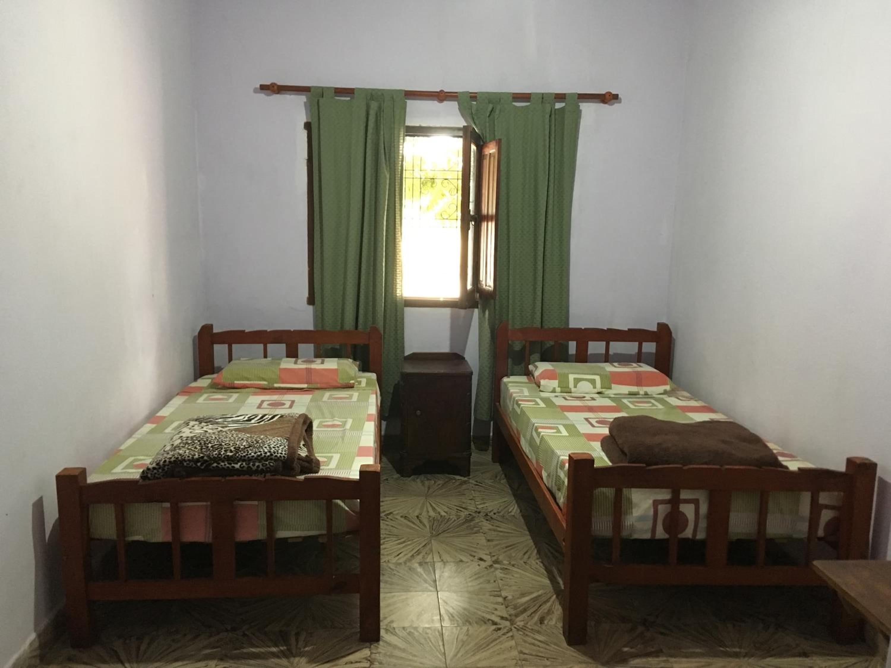 Economy Triple Room photo 2