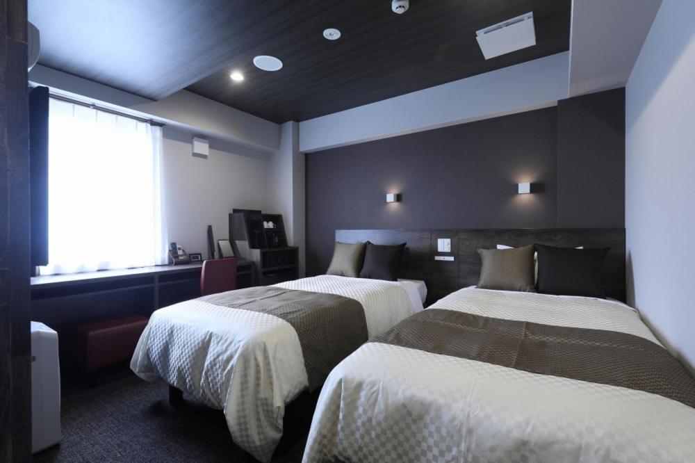 Twin Room - Photo 3