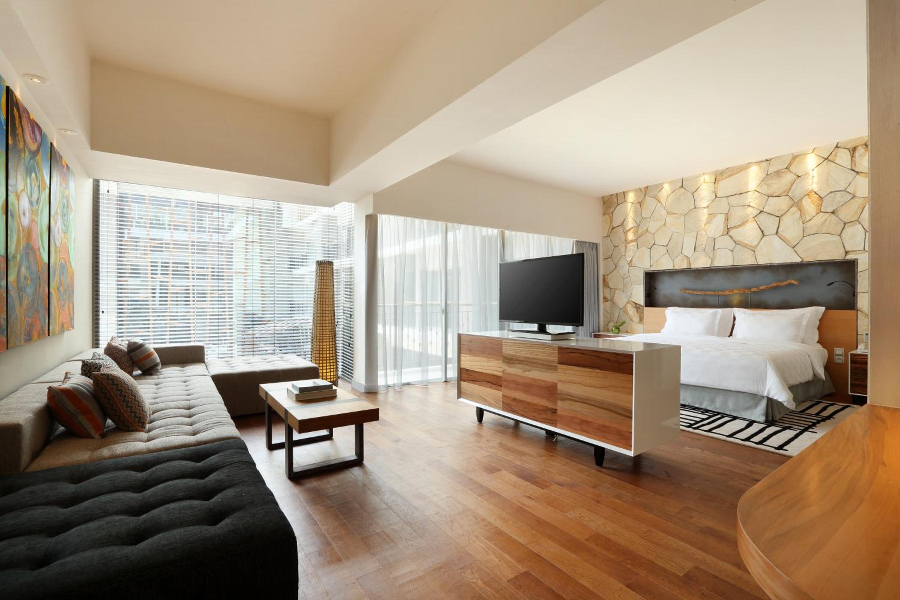 TSand Suite with All Day Breakfast, Daily Restocked Mini-bar and other Free Benefits