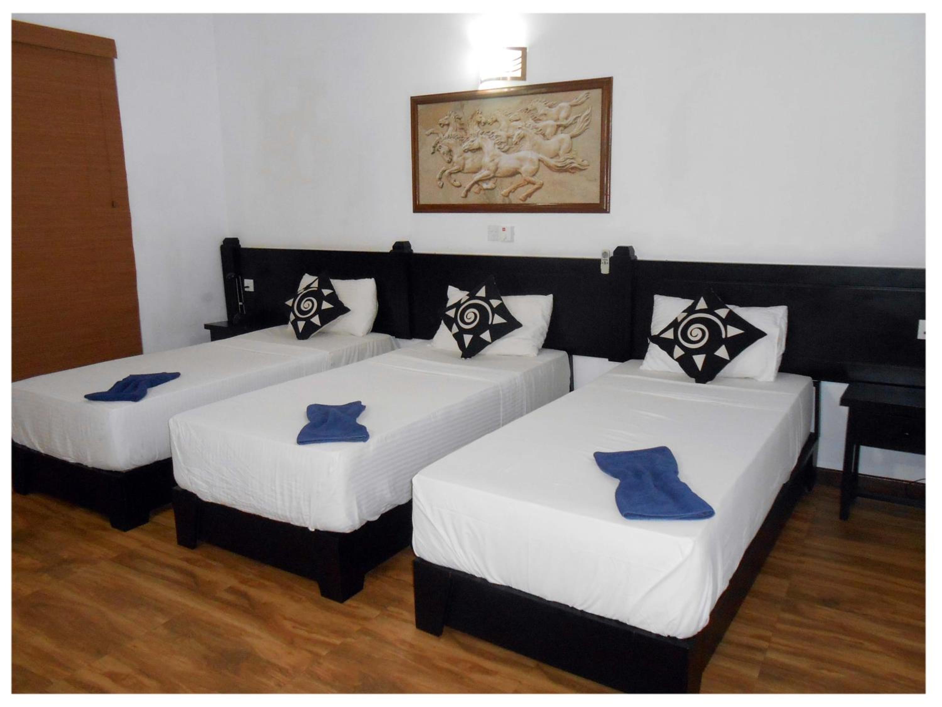 Triple Room with Garden View photo 2