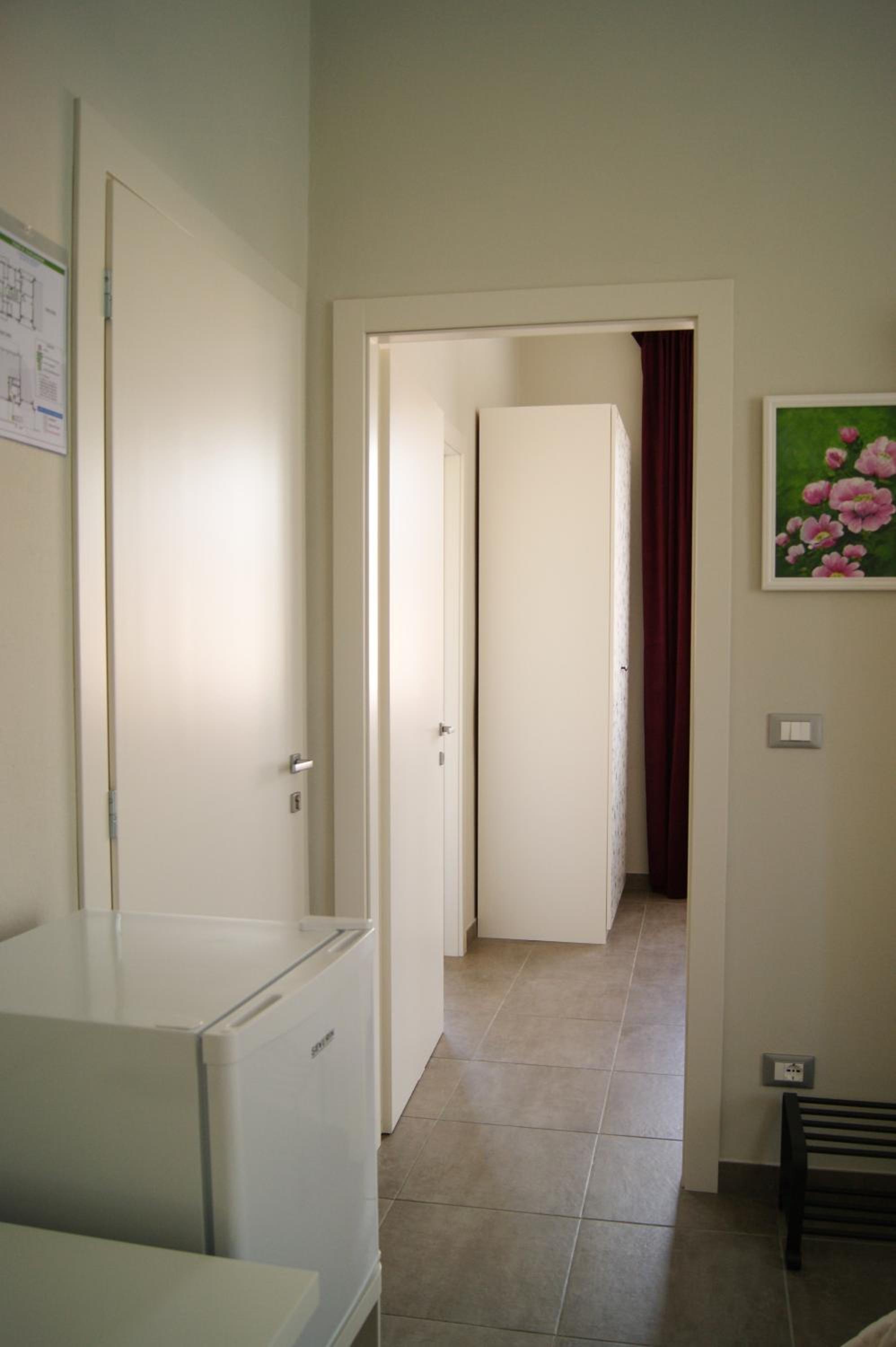 Quadruple Room - Photo 17