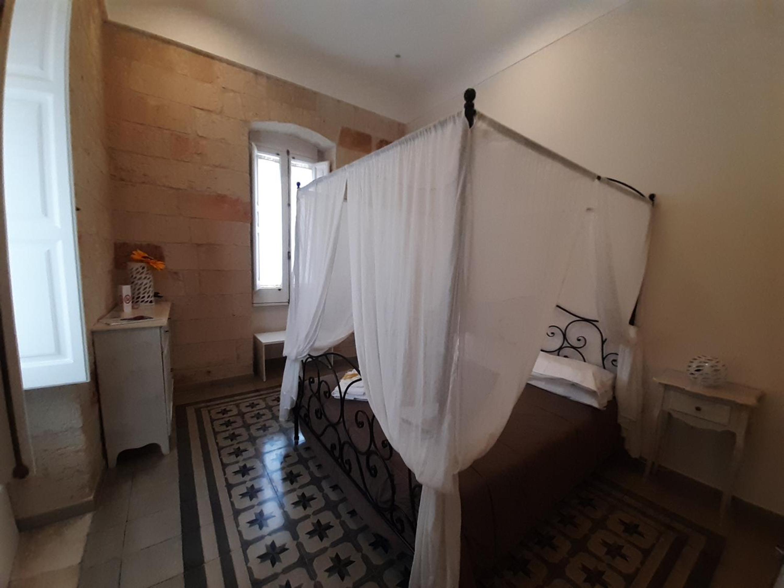 Deluxe Quadruple Room - Photo 9