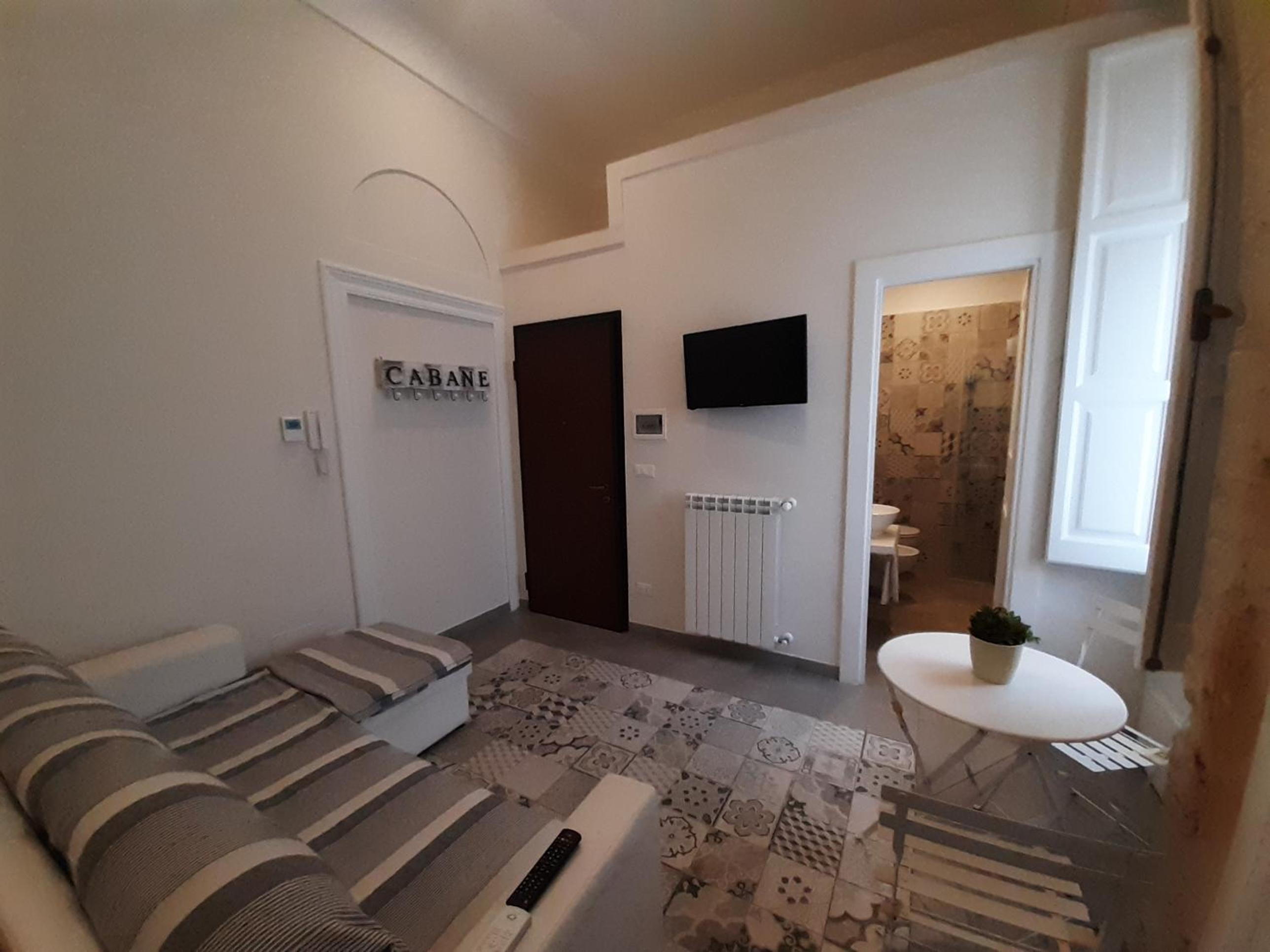 Deluxe Quadruple Room - Photo 8