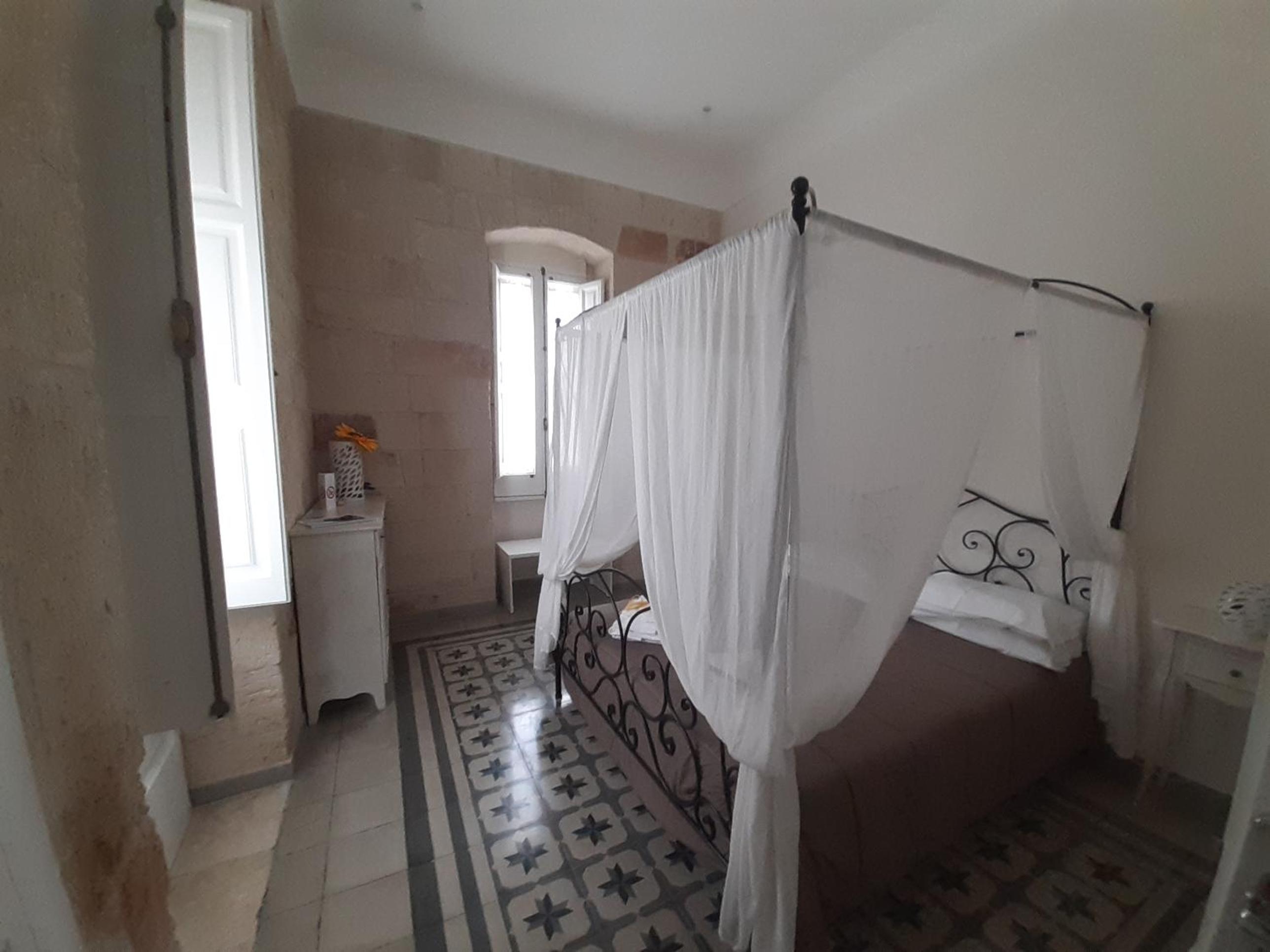 Deluxe Quadruple Room - Photo 11