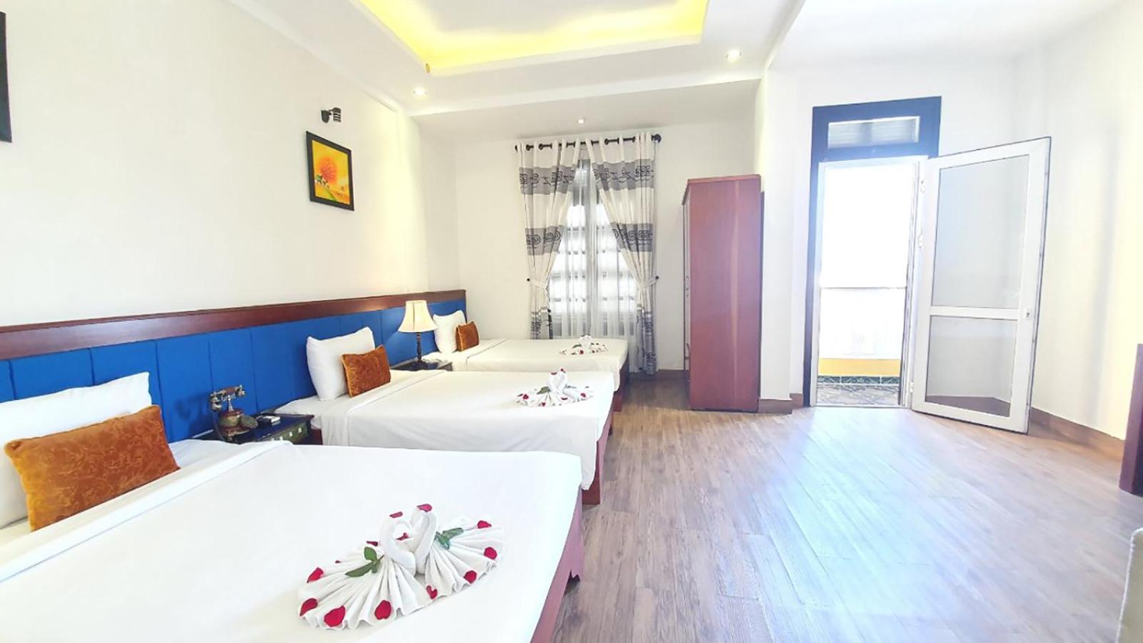 Deluxe Triple Room - Photo 8