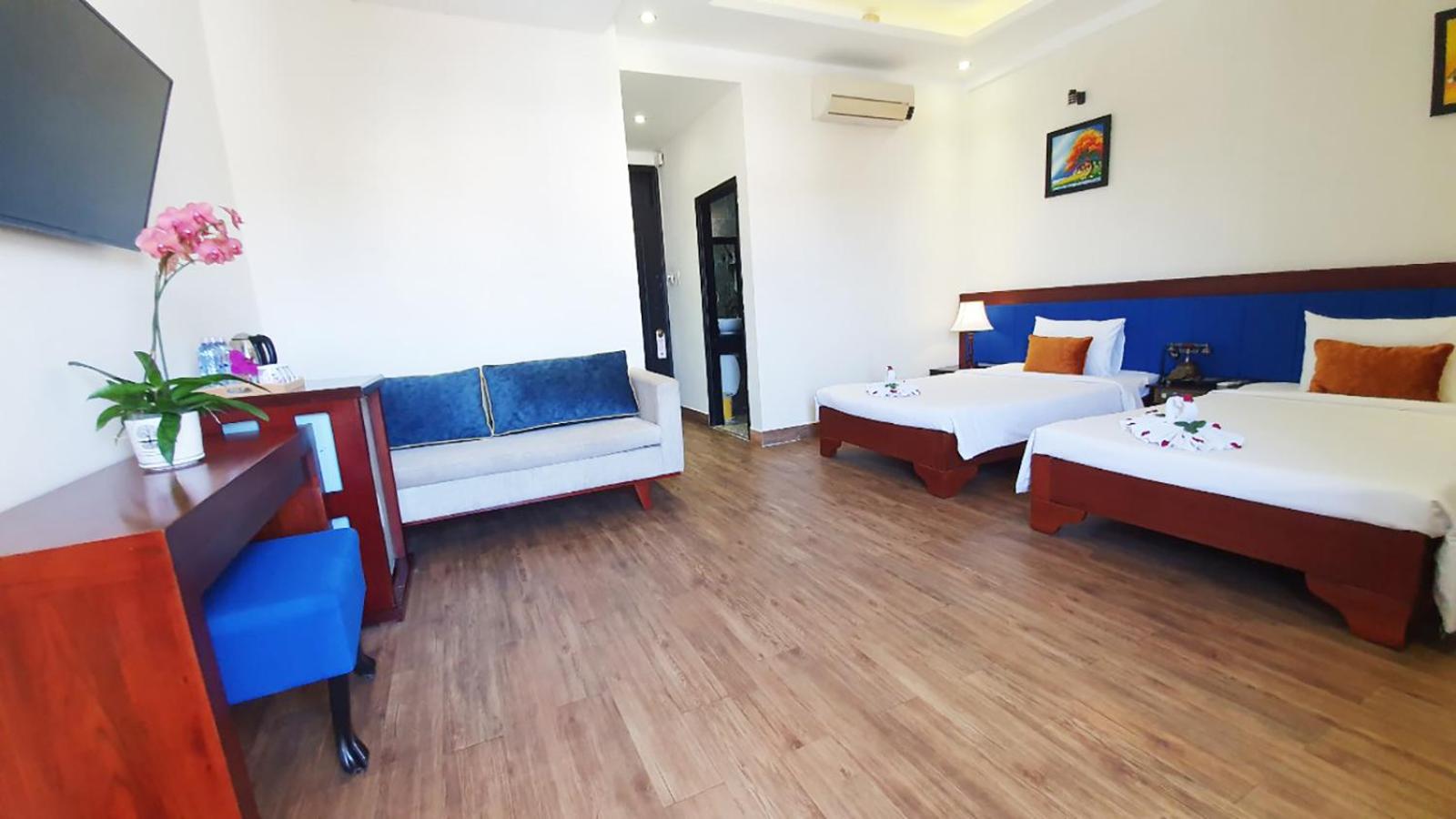 Deluxe Triple Room - Photo 7