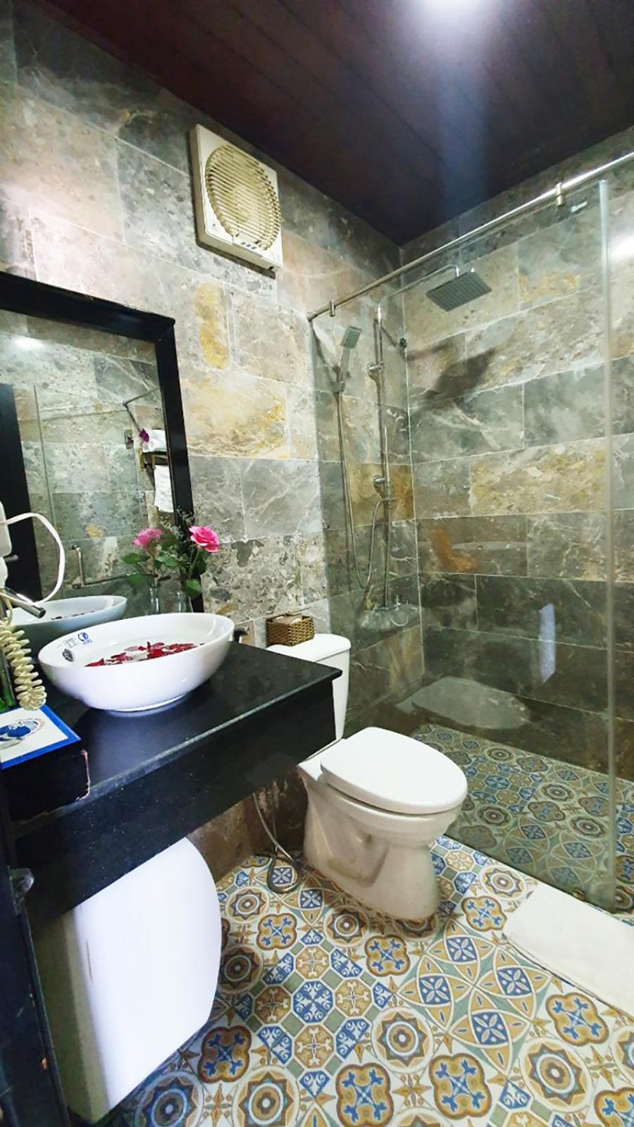 Deluxe Triple Room - Photo 12