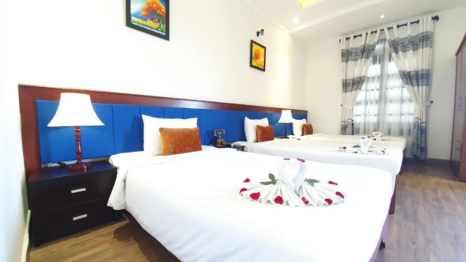 Deluxe Triple Room - Photo 5