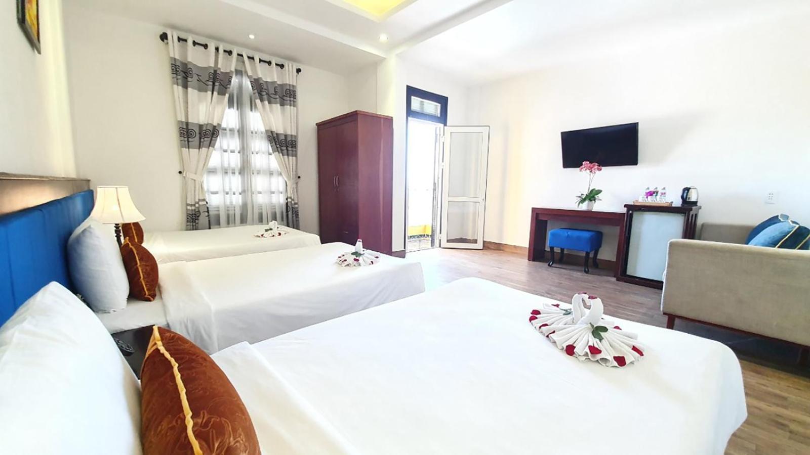 Deluxe Triple Room - Photo 4