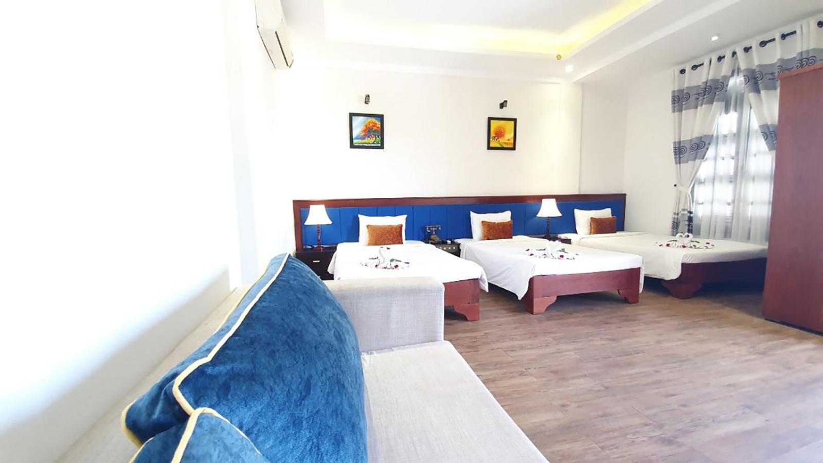 Deluxe Triple Room - Photo 6