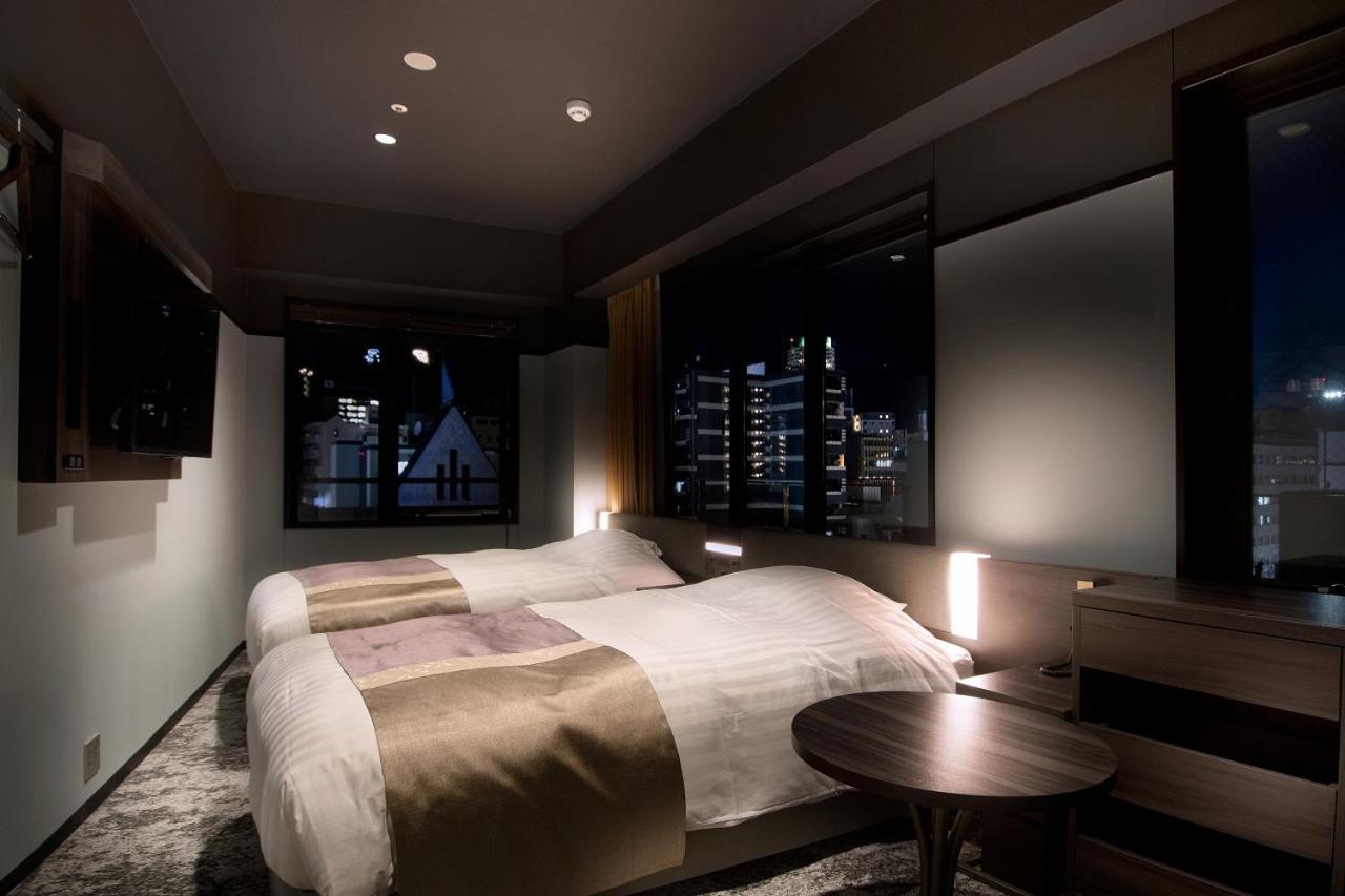 Corner Twin Room - Photo 1