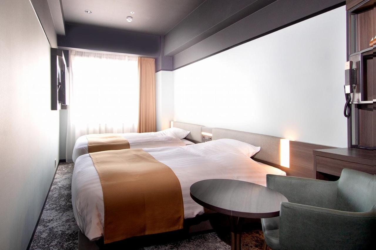 Standard Twin Room - Photo 4