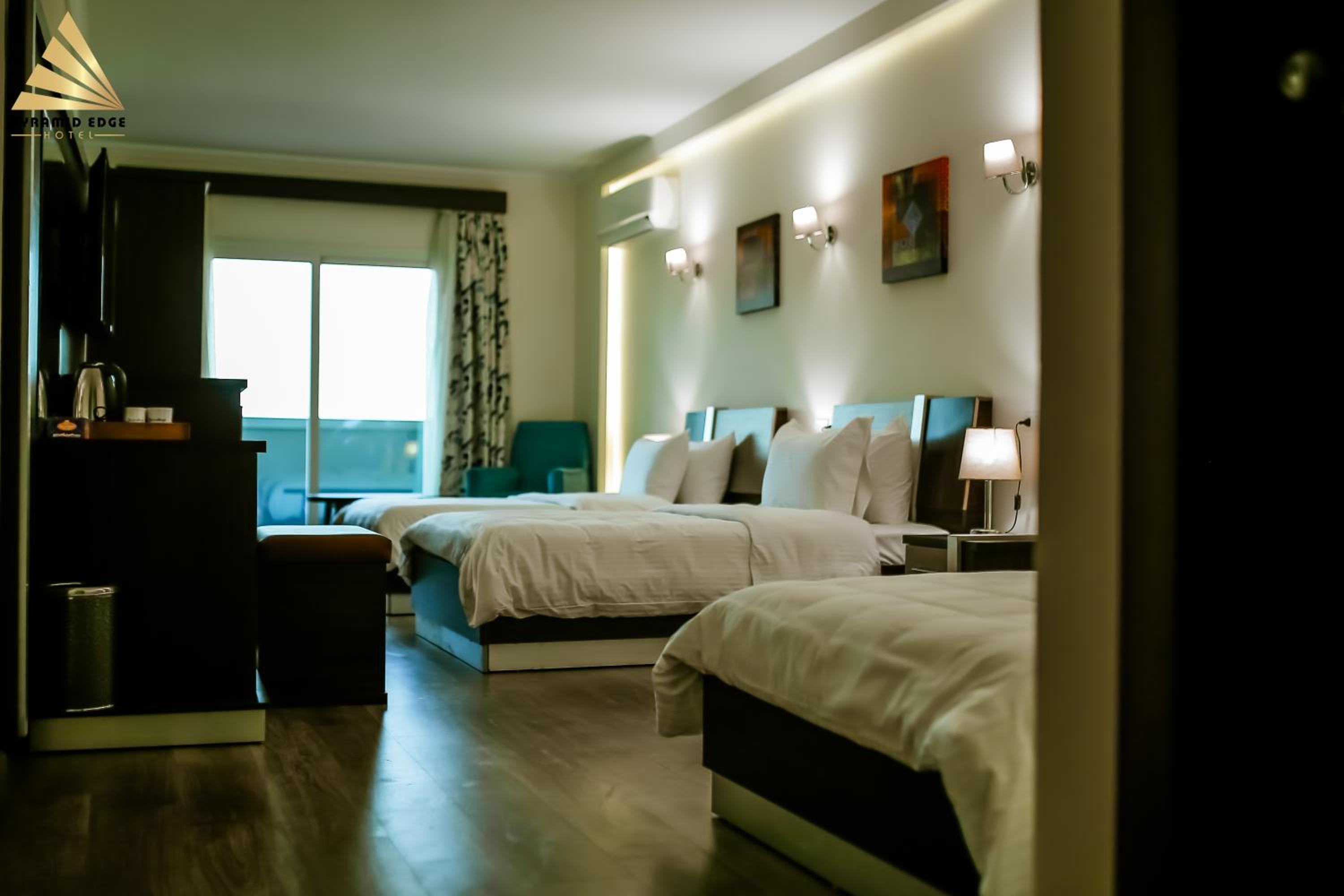 Deluxe Triple Room Pyramids View & Balcony