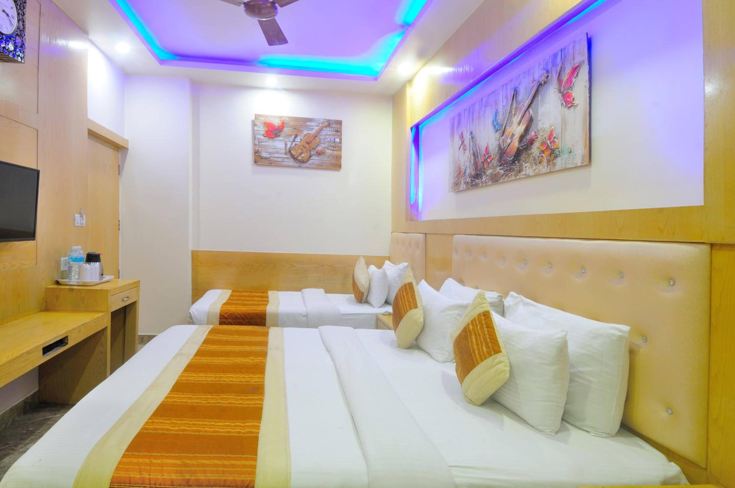 Deluxe Triple Room - Photo 1