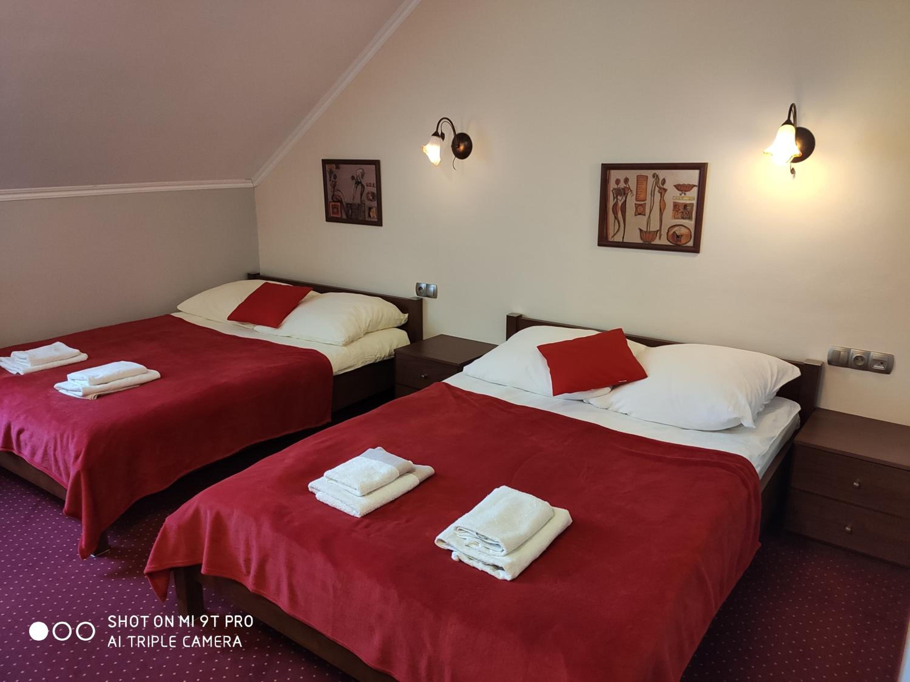 Superior Queen Room with Two Queen Beds - Photo 1